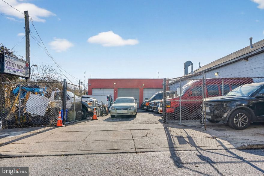 Multi-purpose commercial property ideal for automotive repair, contractor use, auto lot, or small warehouse operations. Zoned for auto use. Features 3-bay garage/workspace, additional room, bathroom, and approximately 1,640 sq ft of interior space. Situated on an expansive fenced-in lot of approximately 3,900 sq ft, offering excellent parking and outdoor storage capacity.
Currently tenant-occupied on a month-to-month lease; property can be delivered vacant at closing. Convenient location close to I-95 and the waterfront. Great opportunity for owner-user or investor.