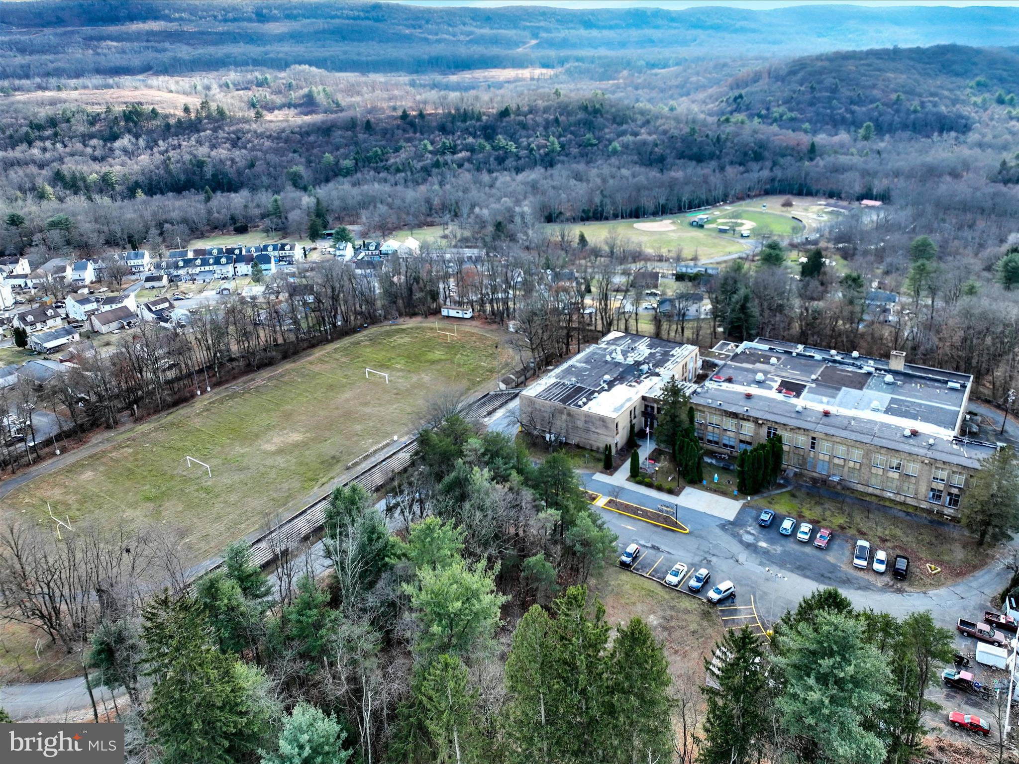 Phenomenal Opportunity: 72,000+ Sq Ft Commercial Property in New Philadelphia
Discover the endless possibilities of this massive 72,000+ sq ft solid brick building, located in the geographic heart of Schuylkill County on 10 sprawling acres. Currently home to The Simon Kramer Cancer Institute and the Schuylkill County Coroner’s Office, this property combines functionality with flexibility, offering a unique opportunity for commercial use in a prime location just 10 minutes from downtown Pottsville.
This impressive building boasts over 60 parking spaces and a wide array of amenities, including a 5,000 sq ft auditorium, an indoor basketball court, and a full-sized football field. Inside, you’ll find 20+ restrooms, multiple offices, private apartments, and a fully operational elevator, making the property ideal for medical facilities, educational institutions, corporate headquarters, or mixed-use development.
Designed for convenience and comfort, the building features a welcoming reception area, a dine-in coffee café on the second floor, and a large conference room perfect for meetings and presentations. Additional spaces include a gym previously used for Curves, expansive indoor storage, garage space, and a toxicology storage room.
Zoned commercial, this versatile property is ready for its next chapter. Whether you’re looking to expand an existing operation or bring a new vision to life, this space provides the infrastructure to make it happen. The property is sold as is, and the seller is open to buyers’ creative ideas.
Don’t miss this extraordinary opportunity. Schedule your tour today to explore the immense potential of this one-of-a-kind property! Type in 15 Alliance Street New Philadelphia, PA 17959 for exact location and gps instructions.
