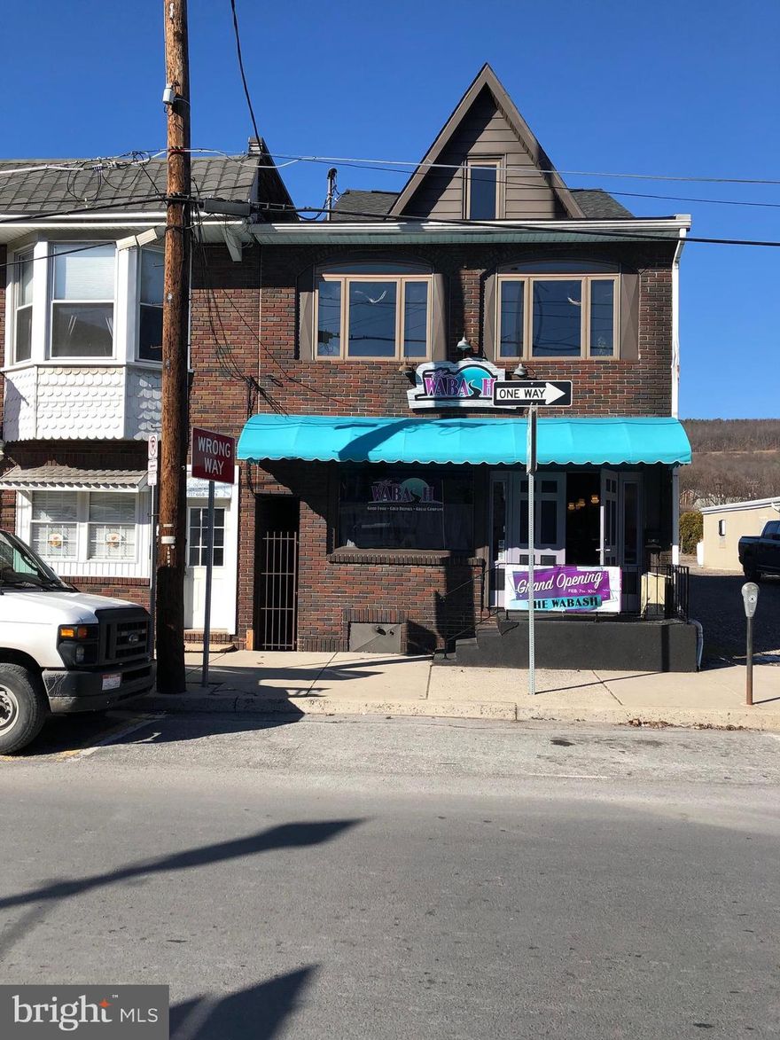Historic Bar for Sale – Turnkey Opportunity in the Heart of Tamaqua! Step into a piece of local history! The Wabash, a beloved Tamaqua bar with roots dating back to the pre-Prohibition era, is ready for its next chapter—and its next owner. This fully operational, turnkey establishment is packed with potential and charm, just waiting for your unique vision. Walk straight into the welcoming main bar space, complete with 14 barstools, a mix of cozy pub-style tables and booths, and seating for 70+ patrons. The layout is perfect for game nights, casual get-togethers, or weekend crowds. A spacious, well-equipped kitchen features ample prep space and a large grill station—ready to handle busy nights with ease. The first floor also includes two restrooms and a hostess station. The second level offers a massive open area with limitless possibilities—convert it into a dining room, game lounge, live music venue, or private event space. It also includes two additional restrooms and a storage room. Out back, enjoy a private paver patio that seats 6+ tables—ideal for summer bands, outdoor dining, or community events. Tons of basement storage plus a large walk-in cooler to keep beverages perfectly chilled. Low taxes! Located within Tamaqua’s CRIZ. All equipment included, making this truly a turn key opportunity. Includes a Schuylkill County R Liquor License. Whether you’re a seasoned bar owner or a passionate entrepreneur, this is your chance to own a slice of Tamaqua’s vibrant history.