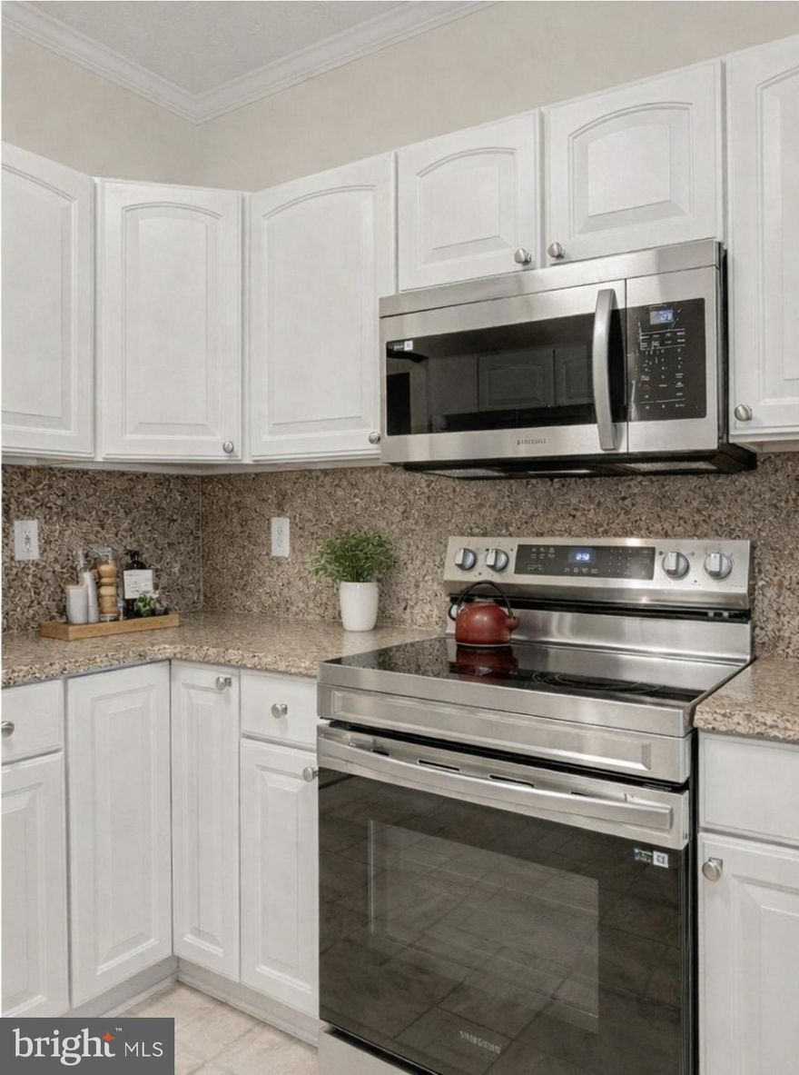 New Stainless steel microwave and Stove!!! Wall paper in the bedroom removed and freshly painted!!! Gorgeous Larger than most at 1658 sq feet Condo in an Elevator Building.. Walk into this Bright Unit with High Ceilings, Large Closets and an open floorplan!!  2 Owner Suites on either side of the unit!  Formal Dining Room, Open Kitchen including Stone Countertops with a kitchen nook leading to a private deck! Owners Suite with a sitting room, Huge walk in closet and Large Private Bathroom with a double vanity!! 2nd  Large Bedroom & Hall Bath next door.. Washer & Dryer Closet.. Water Heater Feb 2025, Service contract paid up until Feb 2026, Newer HVAC & Windows (unsure of age) unit Includes storage unit in building!!!  Condo fees are being increased to $425 January 1 2026