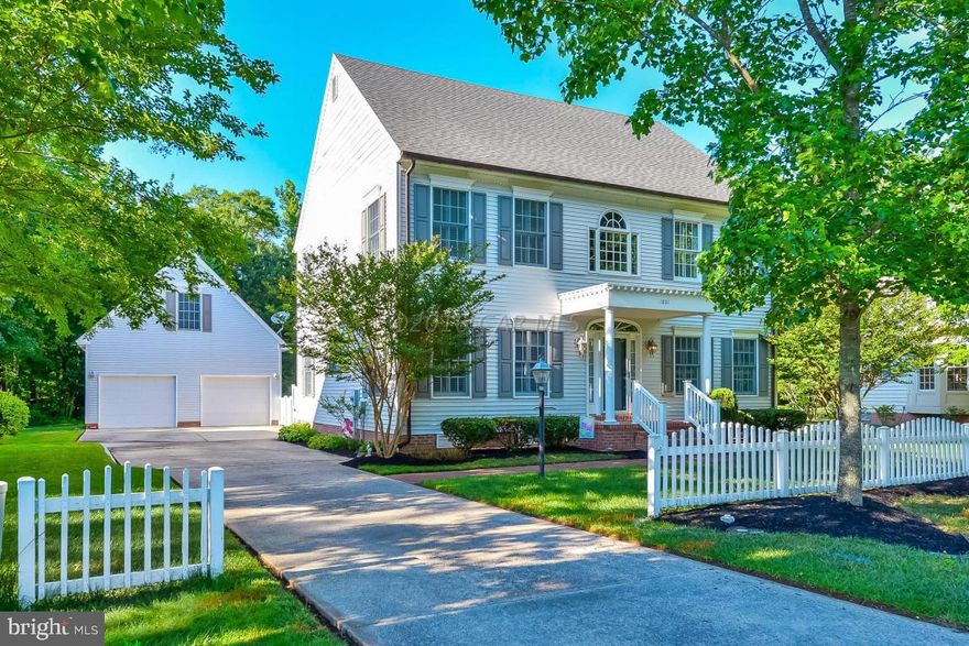 REDUCED PRICE for This Stately Colonial Revival Style Home, part of the Williamsburg Style community of Colonial Village. Built as 4 Bedrooms with 3 full Baths and Hardwood and Tile Floors,decorative millwork includes crown moulding, chair rail and wall panels. Recent Upgrades include Granite Counters, SS appliances with gas range in Kitchen. Rinnai Hot Water System, 2 Zone Energy Efficient Heat System, and climate controlled crawl space. Room above the garage currently used as an exercise room. The spacious yard backs to woods and pond.