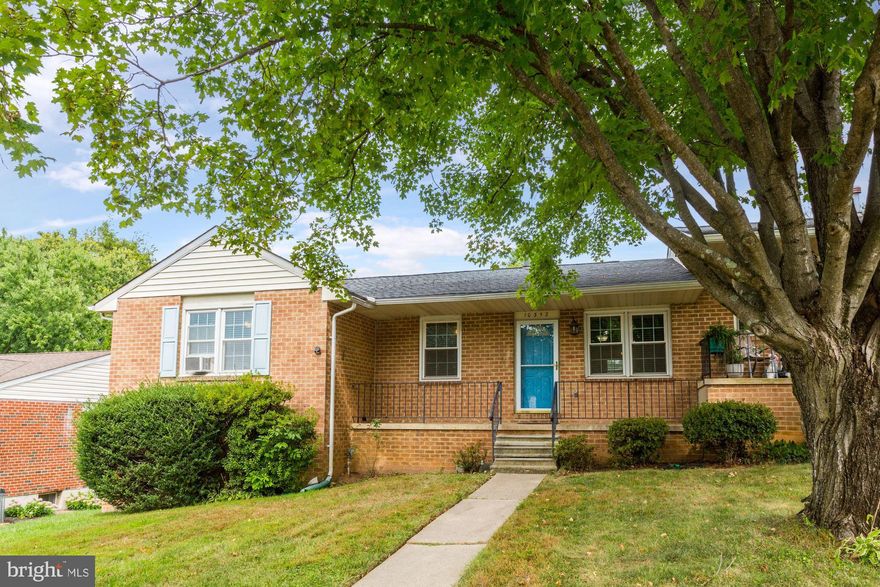Welcome home to this five bedroom, three bath home in Ellicott City! The family room features stunning hardwood flooring, a ceiling fan, and a large window overlooking the lush landscape of the front yard. Off of the cozy family room, you will be lead into the bright formal dining room with crown molding, perfect for entertaining guests! The kitchen boasts hardwood flooring, lots of cabinet storage, ceiling fan, a pass through window and easy access to the large deck and serene backyard. At the end of the day, retire to the owner's bedroom adorned with a ceiling fan, recessed lighting, and an en suite bathroom. Two additional bedrooms and a full bath round out the main level of the home. The newly renovated and spacious lower level is fully finished featuring an expansive recreation area, recessed lighting, luxury vinyl flooring, an additional two bedrooms, and plenty of storage. This private oasis will insist you unwind the minute you walk in!