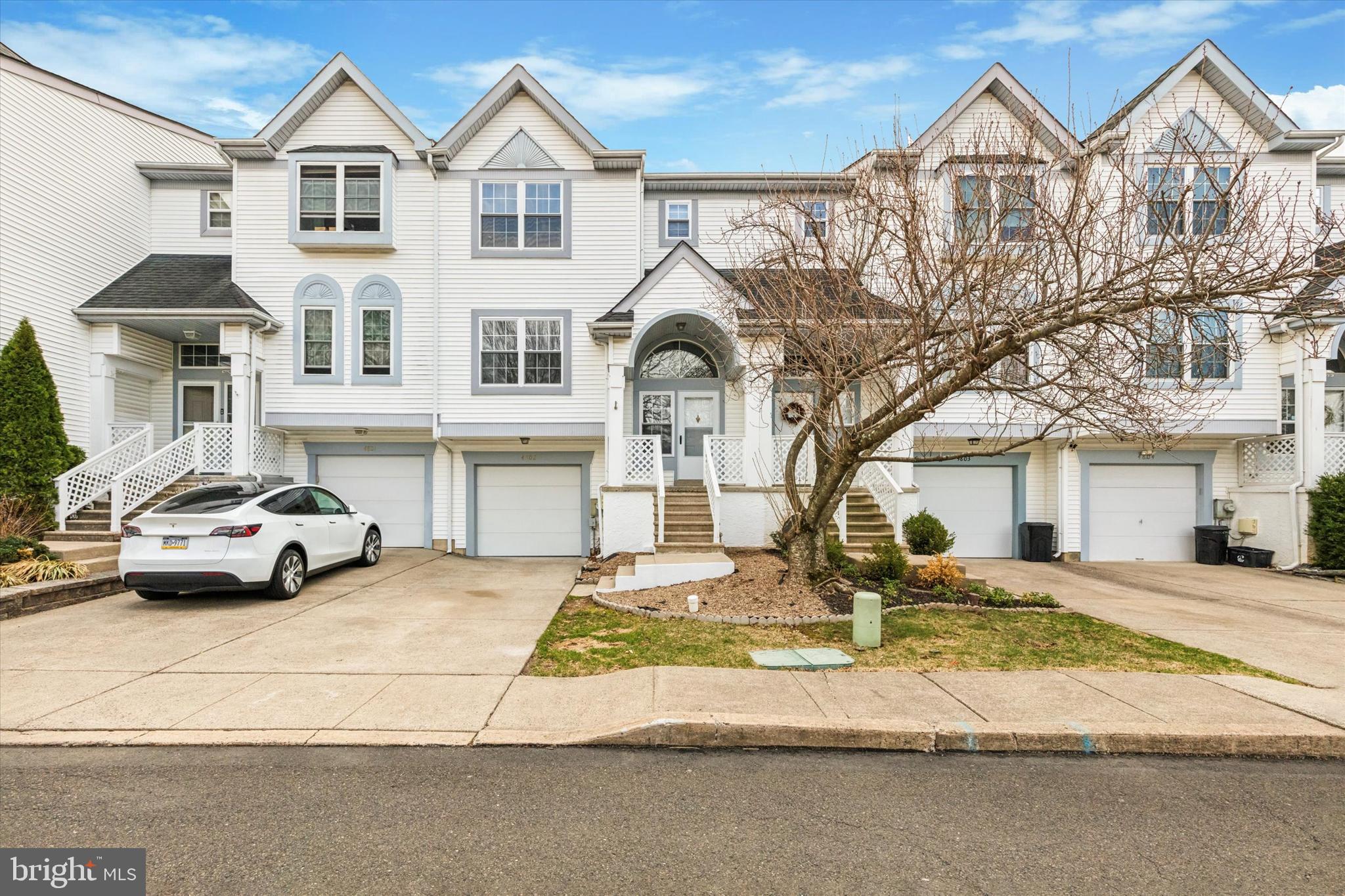 Fantastic opportunity to rent this completely renovated large townhome features 3 bedrooms, 2.5 baths, 1 car garage and a walk-out lower level. This home is located on the Cul-De-Sac in the community of Gwynedd Pointe in North Wales, located within the award winning North Penn School District. As you enter the 2 story foyer up to a few steps, an eat-in kitchen that features quartz countertops, subway tile backsplash, abundant white cabinets, built-in microwave and refrigerator. Adjoining a dining area is large enough for a full dining set, the great room has a wood burning fireplace and leads out to the maintenance free composite rear deck, perfect spot for your morning coffee or BBQ parties with your family & friends during the upcoming summer season. Convenient powder room on this main floor. The second floor boasts the primary bedroom with hardwood flooring, ceiling fan, a large walk-in closet and a beautifully facelifted full bath with a large stall shower. There are also 2 additional bedrooms with ample closets, a full hall bath w/stall shower and a convenient laundry room to round out the second floor. Lower level could be your choice of family room, in-home office or an exercise room with sliders to covered patio while looking over green area. Mechanical room is large enough to utilize as storage space and access to a 1 car garage. You will love the layout, the size and the location! Just minutes from local parks, Montgomery mall, supermarkets, restaurants and countless shopping and easy access to the train, Route 309, 202 and PA Turnpike which makes any commute a breeze.
