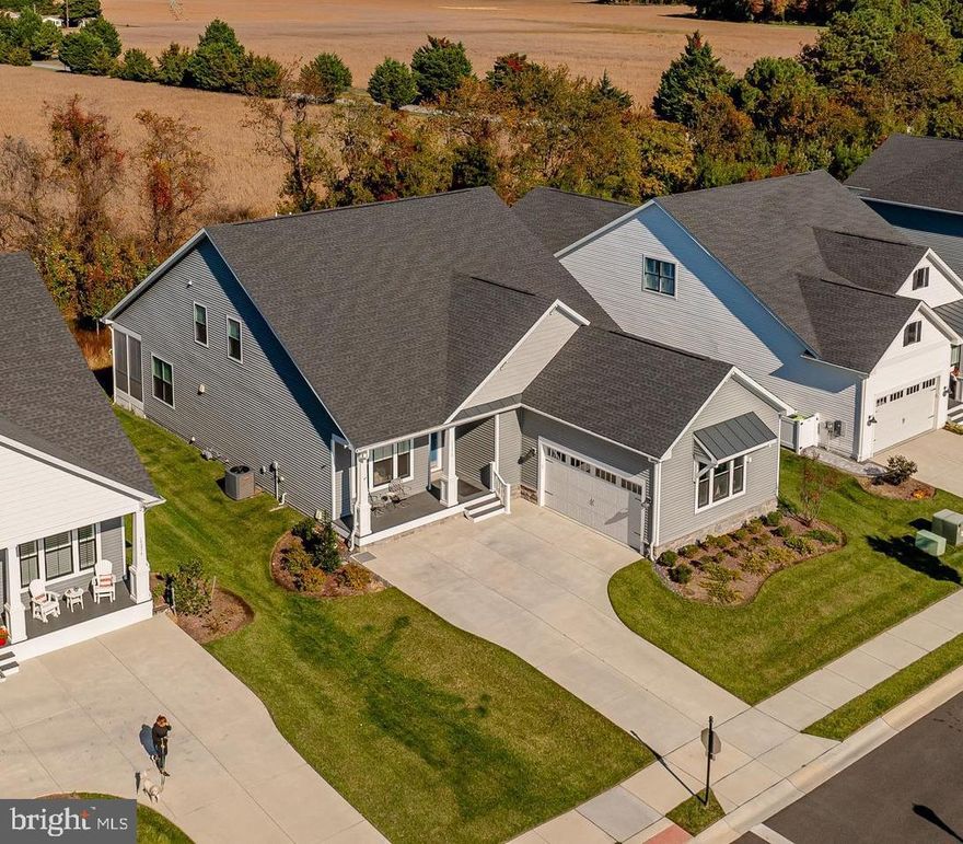 Don’t Judge a Book by Its Cover!
Step inside this impressive Lewes Loft model by K. Hovnanian, 5100 sf featuring 5 bedrooms and 4.5 bathrooms, including a fully finished basement that truly expands your living space.

Located East of Route 1 in Tower Hill, this home is perfectly situated near the beaches, restaurants, hospitals, and shopping — everything you need within minutes. And the perimeter lot is a bonus!

The main level features a flexible home office or sitting room, two bedrooms with a shared full bath, and a luxurious primary suite complete with a spa-style bath — featuring a massive walk-in shower with a rainforest showerhead, dual vanities, and two walk-in closets.

The gourmet kitchen will delight any cook, showcasing Quartz countertops and backsplash, stainless steel appliances (including double wall ovens, gas range, dishwasher, and microwave), plus a butler’s pantry for added convenience. The living room offers built-in surround sound, perfect for entertaining. A large laundry/mudroom includes a sink and custom storage, leading out to a two-car side-load garage with epoxy flooring, a mini-split climate control system, and an EV charger.

Upstairs, you’ll find a spacious loft, an additional bedroom, and a full bath — perfect for guests.

The partially finished basement is an entertainer’s dream, including a kitchenette with microwave, wine refrigerator, soft-close cabinetry, a bedroom and full bath, living and dining areas, a home office and fitness area, and unfinished storage for organization.

This home is sure to impress.  Schedule your private showing today!