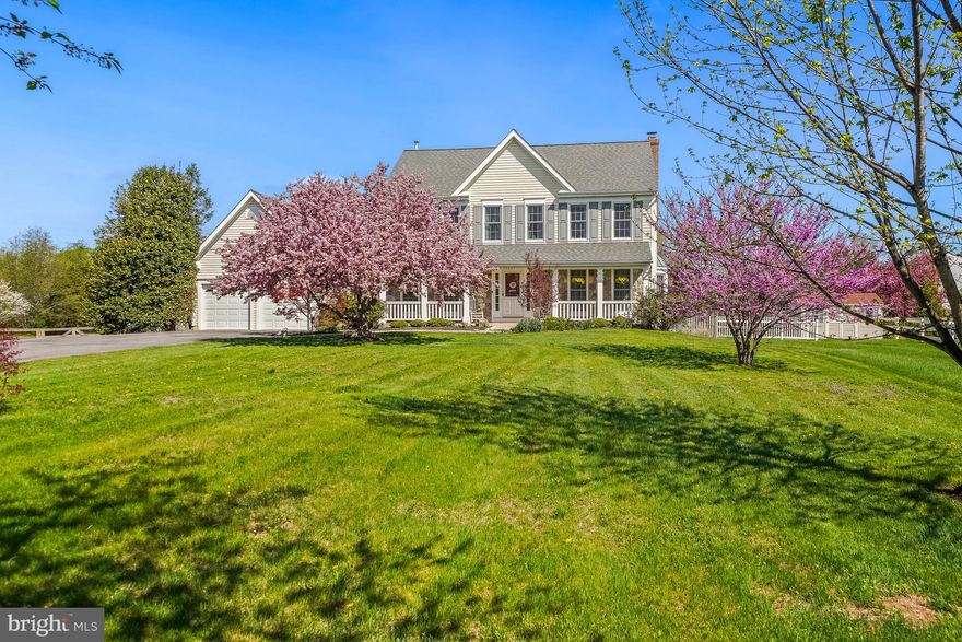 Welcome to 19603 Seymour Court in highly desirable Poolesville! Nestled on a pristine 0.88-acre cul-de-sac lot, this beautifully maintained home offers over 3,600 square feet of thoughtfully designed living space across three finished levels.

From the moment you arrive, the inviting front porch and lushly landscaped yard sets the tone for what’s inside. Step into a bright main level featuring gleaming hardwood floors, formal living and dining rooms, and an abundance of natural light streaming through the new windows (2025). The heart of the home is the gourmet kitchen remodeled in 2016, showcasing crisp white cabinetry, quartz countertops, a spacious peninsula with breakfast bar seating, and sleek black stainless steel refrigerator (2024). The kitchen flows seamlessly into the cozy family room, highlighted by a floor-to-ceiling stone wood-burning fireplace and custom built-in shelving.

Off the kitchen and family room is a large enclosed porch provides the perfect space for indoor/outdoor living, overlooking a fully fenced, beautifully landscaped backyard with a peaceful, park-like setting. The main level also offers a versatile bedroom or home office, a powder room, a dedicated laundry room, and convenient access to the attached two-car garage.

Upstairs, you’ll find four generously sized bedrooms and two full bathrooms. The primary suite features room for a sitting area, a walk-in closet, and a beautifully renovated ensuite bath (2025) complete with a dual sink vanity, soaking tub, and a walk-in glass and tile shower. The secondary bedrooms are well-appointed and share an updated hall bath with beautiful tilework detail and stylish finishes.

The finished lower level adds even more flexible living space, including a large recreation room, a full bathroom, a bonus room with cedar closet perfect for guests or a home office, and additional storage/utility space with built-in shelving.

Additional home highlights: New Windows 2025, Whole Home Water Filtration System 2025, Exterior Painting 2024, New Roof 2023, New Attic Insulation 2023, Driveway Repaving 2022, HVAC 2016.

Located in the charming Town of Poolesville, this home offers the perfect blend of comfort, space, and community while being just moments from local shops, restaurants, and community amenities and events. Don’t miss this exceptional opportunity to call it home! Schedule your showing today!