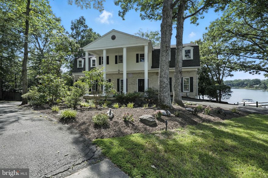 Welcome to this beautiful colonial on Swan Creek with it's own private dock.  The home has updated kitchen and baths, vaulted ceiling in the family room and kitchen. and  10  foot ceilings throughout the first floor There is a beautiful deck overlooking the water.
The lower level is a separate mother-in-law suite with a full bath, bedroom, kitchen, ,see-thru fireplace.and
laundry room.

The first floor has a lovely family room off the kitchen with a see thru fireplace into the large office.
This home also sports a living room and library with beautiful built-ins.  The whole home has been freshly painted in a nice neutral color.  There has also been extensive landscape work completed.  Don't miss the sunroom off the beautiful gourmet kitchen.

There is an adjoining waterfront lot which would be available to purchase for the purchaser of the house.

The community has tennis courts a dog park and a rec area for children including a soccer field.  There are also two private marinas.

This home is in the sought after Tantallon on the Potomac neighborhood which is conveniently located to the National Golf and Country Club and very convenient to the bus and  parking.

 this rare find.

Conveniently located to Bolling and Andrews' AFB, National Harbor, VA and DC