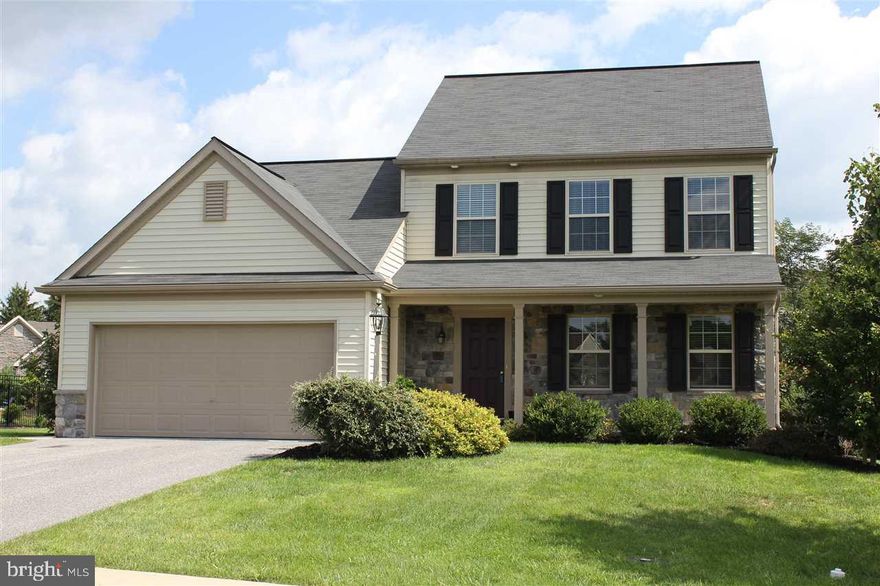 Attractive mix of manufactured stone under front porch and vinyl. 2 car garage and a large composite deck all within the quiet surroundings of a desirable small community in West Hanover Township.  Steps from the nature walking path. Open concept plan. Hardwood in foyer. 3' family room bump-out and gas fireplace. Breakfast area and Island with overhang for stools. Beautiful 16 x16 Azek Deck.. Superior wall basement. Washer, Dryer and Refrigerator stay.
