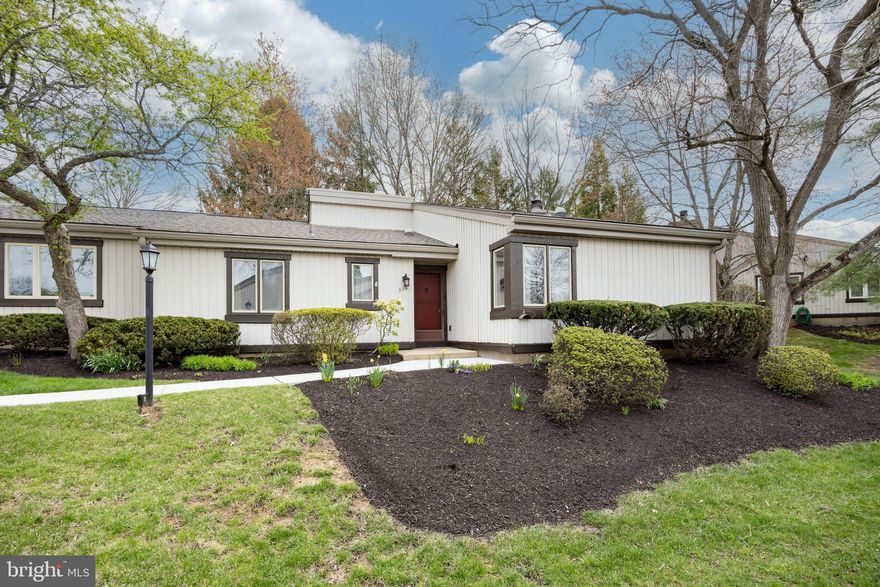 Welcome to 326 Devon Way in the desirable Hershey’s Mill 55+ community In West Chester.  This gated community provides a low-maintenance lifestyle for the most discerning buyer.  Step into the foyer with laminate flooring.  There is a double coat closet in the foyer.  The eat-in kitchen has raised panel cabinetry, Corian countertops, under cabinet lighting, a double sink, appliance garage, flat top range, dishwasher, and microwave.  Bar stool seating at the peninsula as well as a separate area for kitchen table. The laundry is conveniently located within the kitchen behind double doors.  This room gets lots of natural light.  The adjacent dining room is a nice space for entertaining.  The living room has a wood-burning fireplace and a wall of built-in cabinetry.  Sliding glass doors off the living room give access to a 3-season room with full wrap-around windows. Rear of home has privacy with a beautiful tree line. The primary bedroom, with walk-in closet, has an en-suite bath with walk-in shower, tile floor, and a linen closet. An additional bedroom, with 2 double closets, and a hall bath with tub are on this level. A finished basement lends nice room for many options, including a media room, craft room, office, and more.  A conveniently placed powder room and a laundry tub are bonuses in the basement! 2 additional rooms for storage, which include shelving.  This property includes a one-car detached carport, with storage closet, located just steps away from the front door.  There is also a nice size storage closet off the back of the house. The vibrant Hershey’s Mill community offers amenities such as walking paths, community pool, tennis and pickleball courts, community garden, woodshop, and clubhouse!  Roofs in community were recently replaced.  Bring your ideas to make this home all yours!  Enjoy easy access to major commuter roadways, top-tier healthcare, shopping, and lots of dining!  Membership at the golf club is available for an additional fee. 326 Devon Way is a place you will love to all home!  Property is being sold as is.