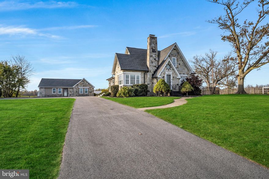 Welcome to 3266 Hanover Pike, your dream home in Hanover, PA, where picturesque farm views and serene sunsets over a horse pasture create a stunning backdrop for everyday living. This  4-bedroom, 3-bathroom home is filled with custom upgrades and thoughtful design—nothing here is builder grade. The kitchen is designed for the best home cook, featuring recently installed granite countertops and updated with KitchenAid appliances. Relax in the cozy living room with a stunning stacked stone fireplace, window seats with storage, and custom built-in shelves. The main floor bathroom has been beautifully remodeled with a custom walk-in shower—just one example of the many unique touches throughout this home. The primary bedroom, located upstairs, features two walk-in closets—no more sharing closet space! The luxurious primary en-suite also includes a jetted tub and standalone shower. For added convenience, laundry hookups are available on both the top level and in the finished basement. The finished basement provides additional living room space, perfect for a cozy family room, media room, or home office. You’ll also enjoy the benefits of smart home features throughout, including light switches, thermostats, and blinds. Outside, the home sparkles year-round with permanent, seasonal festive lighting. This home also includes a detached oversized garage with extended height garage doors, featuring 3 parking spots plus lots of extra room for storage. One of the parking spaces has garage doors on both sides, making it easy to pull through for added convenience. The garage, equipped with electrical service, is fully heated and cooled, with a half bath, and has ample storage space on a second level. Perfect for multi-generational living, the detached in-law quarters offer an additional 2 bedrooms, 1 1/2 baths, its own laundry room, and a fully equipped kitchen and dining room—all appliances included. Located perfectly for an easy commute to Maryland, this home offers country charm while keeping you close to major routes. With a newer roof and no detail overlooked, this property is your perfect combination of charm and modern amenities.