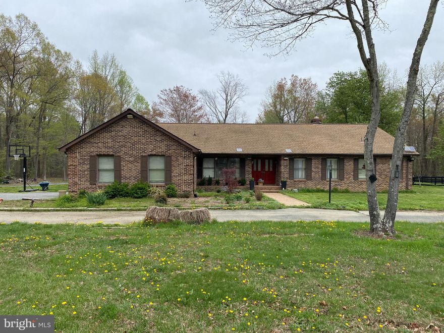 Fabulous potential awaits the astute buyer of this spectacular 16+ acre  homestead. As a matter of fact, this property rests on two parcels. 6562 AND 6572,  and together they total approximately  16.4  acres! In addition to the main house, a solid brick, thoughtfully laid out rambler, which  boasts 4 bedrooms, 3 full baths with gorgeous flooring, beautiful wood burning fireplace, home office and an in ground pool, the new owners will have 3 additional properties that are individually metered for electricity which have been used as income producing properties, each with its own separate entrance. (1 main level 1br 1 bath unit and 2 upper-level 2 bedroom 1 bath units) Property is endowed with a functional barn supplied with electricity, a stable with 4 stalls, a paddock and a pasture, a pond, a huge garage and lots of opportunity to create the kind of multigenerational housing compound that one would generally dare not to even dream of acquiring. Close to shopping, restaurants, schools, churches and major attractions, this beauty yearns to have her full glory revealed.  Property is unburdened by covenants or restrictions, so by all means, let your imagination run wild as you envision the possibilities. Don't hesitate. Make your plans to view this belle before she's swept away!