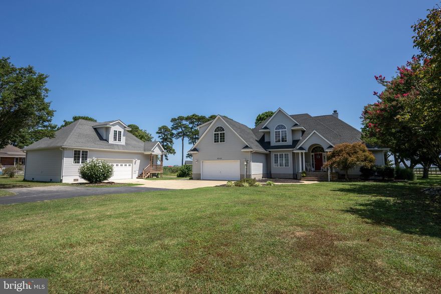 The perfect house checklist.  1. Waterfront with a dock and deep water. 2. Breathtaking sunrises. 3. Marina and beach nearby.  So this is it! Your perfect day starts with breakfast on the gazebo watching the  breathtaking sunrise over the Chincoteague Bay.    After breakfast, you can launch your kayak or paddle board for some exercise in the water.  Afternoons are a good time to jump on the boat for a day of fishing and crabbing. You also have the option of going to the pier at Public Landing just around the corner.  This expansive dock is a hot spot for crabbing and fishing as well and the  marina and beach are just 1 mile from the pier.  Some of the homes features include first floor en-suite, stone fireplace in the vaulted ceiling living room and make for some very cozy nights, huge bonus room over the garage with amazing views ( Perfect for a craft room or in home office ), 2 car attached and another 2 car detached garage that has an office space with breathtaking views, deeded dock, area to install a boat lift, a bathroom that has an entry door next to it for cleaning up after a day of fun on the water, freshwater pond with tons of birds, frogs and wildlife and a salt water gullet with crabs.  The location is central to many local attractions including Seafood and Marina at Baywater Landing just 1 mile away, sandy beach and second marina just 2 miles away with  boat ramps and picnic area, Ocean City's world famous beaches and boardwalk just 29 miles, 25 miles to NASA/Wallops Island, 22 miles to downtown Berlin voted one of the coolest small towns in America with its quaint shops and dining, 27 miles to Assateague National Seashore where the wild ponies roam free, 33 miles to the peaceful yet fun island of Chincoteague and just 21 miles from Atlantic General Hospital. Waterfront homes in the area do not become available very often as this area. Situated on high ground, It is truly a hidden gem! The new chapter for you begins here and after all....You Deserve It!