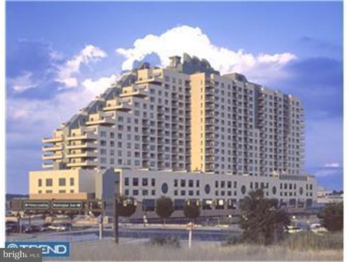 Waterfront Condos The quality features at The Residences at Dockside include huge windows framing extraordinary city and river views, spacious designer kitchens, full-sized stacked washer and dryer, hardwood floors in living areas and kitchen, wired for high-speed and internet access. The amenities and conveniences that accompany Dockside include three levels of indoor parking space with security-gated access, one reserved parking space for each Dockside resident (with additional spaces available for purchase), elegant lobby w/24 concierge, health and fitness facility, heated indoor swimming pool and hot tub, spacious community/entertainment room with party kitchen, big screen tv, surround sound system and expansive terrace with remarkable views.