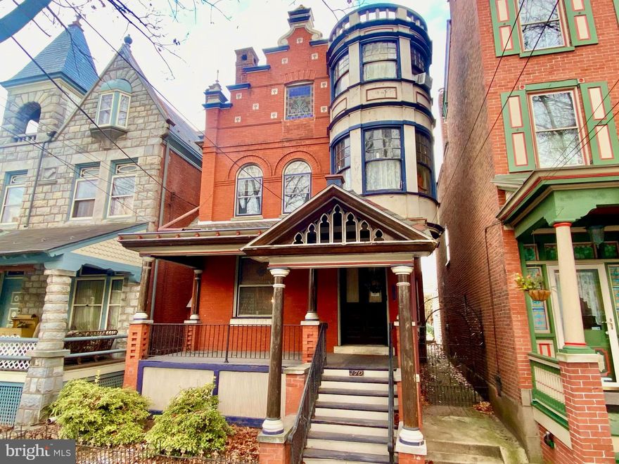 Spectacular, circa 1892 +/- Queen Anne Victorian located in a beautiful historic neighborhood, just a few blocks from the heart of Pottstown’s vibrant and revitalized downtown.  Currently occupied  as 3 apartments, this majestic 3 story property makes an impressive architectural statement with a grand, deep front porch; two-story turret; stained glass and Palladian windows; custom brick and tilework; detailed woodwork; decorative shingle siding; incredible custom ironwork gate and archway; and ornate finials.
Twin sets of double doors open to reveal rich 19th century character fills the expansive interior. You’ll discover ionic columns, high ceilings, ornamental cornices and plasterwork,  inlaid and parquet hardwood flooring, pocket doors, vintage lighting fixtures, custom tilework, historic hardware, detailed woodwork, built-in cabinetry, and stained-glass windows throughout the structure. 
Presently the building is divided into 3 residential units:  one two-story 2-bedroom apartment and two 1-bedroom units on the upper levels.  The spacious main unit encompasses the first floor with living room/parlor, dining room, family room with walk-in bay window, two fireplaces, eat in kitchen, sunroom, and powder room, plus 2 bedrooms and a full tile bathroom on the second floor.  The other 2 units, accessed by a beautiful detailed staircase, include distinctive circular turret alcoves.  With front and back staircases, the floorplan can be reconfigured to be utilized in multiple ways or be reconverted to one expansive 6+ bedroom single family residence.  
You will enjoy outdoor entertaining and relaxing on the deep front porch, back porch and rear brick patio areas.  Detached one car garage and off-street parking for about 4 cars.  Great location close to Pottstown’s many unique restaurants, coffee shops, outdoor eateries, historic carousel, assorted parks, popular Schuylkill River trail, the Steel River Playhouse community theater.
This property is a great opportunity to live in a one-of-a-kind architectural Masterpiece, rich in character, charm, and history.