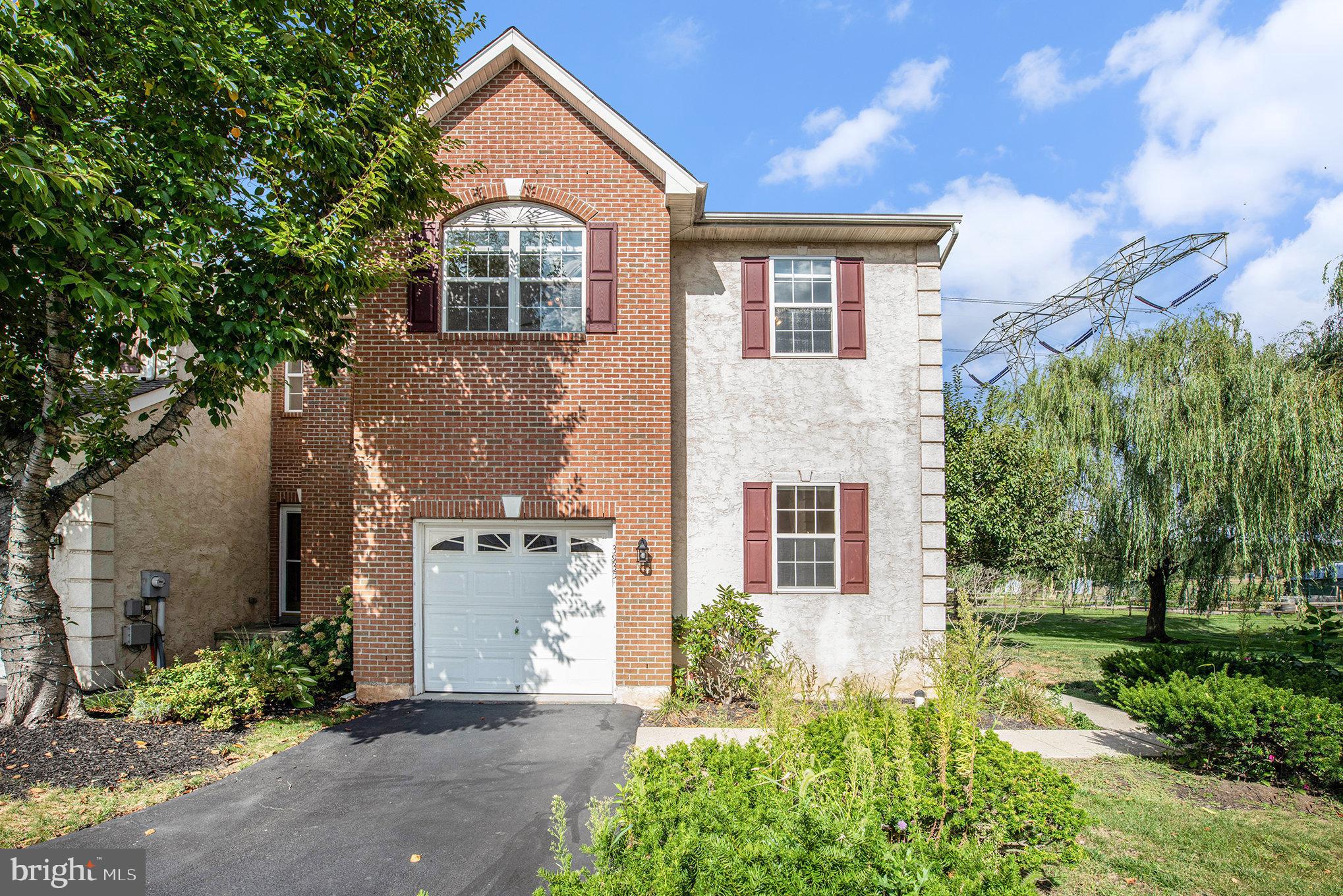 Ready for Immediate Move-In! Welcome to this immaculate 3-bedroom, 2.5-bath townhouse boasting over 2,000 sq. ft. of living space in the highly desirable Monroe Court community of Skippack Township. Perfectly tucked away off the beaten path, this community offers the best of both worlds — peace and privacy with the convenience of nearby amenities. Step inside to a two-story foyer that sets the tone for the versatile main level. The well-appointed kitchen features ample counter space, generous cabinetry, a pantry, and matching appliances. A bright dining area with French doors opens to a large deck, perfect for enjoying meals while overlooking the backyard. The adjacent family room with a cozy gas fireplace is ideal for entertaining or relaxing, while a bonus flex space can serve as a formal living room, home office, or playroom. Rounding out the main level are a half bath, coat closet, and access to the oversized garage. Upstairs, the luxurious Owner’s Suite impresses with vaulted ceilings, a walk-in closet, and a bath complete with dual vanity, soaking tub, and stall shower. Two additional bedrooms with large windows and generous closets share a hall bath with a tub/shower combo. A convenient upper-level laundry room completes this floor. The finished basement will not disappoint, featuring a custom-built bar and plenty of space for a media room, gym, or recreation area, along with unfinished storage space. Additional highlights include a private side entrance, new flooring, fresh paint, recessed lighting, ceiling fans, neutral décor, and a large rear deck with steps leading to open common space. Premier Location! Walking distance to Skippack Elementary and just minutes from Skippack Village, parks, major routes, and more! Schedule your private tour today!