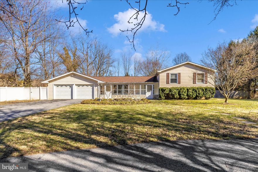 Welcome to Pleasant Grove, a neighborhood where the name says it all. Set on nearly an acre (.93 acres) with NO HOA and featuring an oversized attached garage of approximately 846 square feet, this split-level home offers space, flexibility, and a rare amount of parking and work space. The garage can accommodate up to four vehicles with two parked side by side and two behind, or provide excellent space for a workshop, hobbies, or storage. The roof was replaced approximately five years ago, offering added peace of mind. 

Built in 1979, the home offers 3 bedrooms and 2.5 baths. The bedroom level includes a nicely sized primary bedroom with two closets and a primary bath that is larger than typically found in homes built around the same time.  A second full bath on the bedroom level features dual sinks and a tub/shower combination. The generously sized living room features a fireplace, adding warmth and character to the space. 

The lower level includes a family room, half bath, laundry area, and a separate office. From this level, a short set of stairs leads to a fully covered and enclosed breezeway-style area that provides convenient access to the outdoors while offering protection from the elements.

The level yard offers plenty of usable outdoor space and is complemented by a circular driveway connecting two straight driveways for easy access and additional parking, along with an outbuilding that provides additional storage space.

Lovingly maintained by the same owner since 1980, the home offers a wonderful opportunity to update and personalize over time. It's a solid home ready for its next chapter.