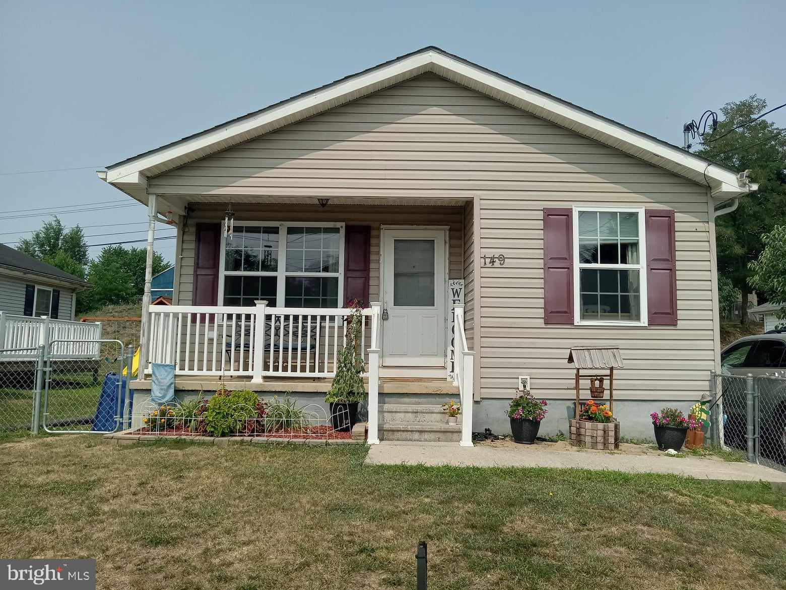 Great opportunity to own this beautiful home with 3 bedrooms and 1 full bath in Martinsburg, WV. This home including beautiful LVP flooring throughout. The kitchen features large pantry and laundry room adjacent, with plenty of storage. It has a cute master bedroom with a small private backyard. Nice chain link fence in front ready for the pets. Quick access to I-81 for easy commutes, shopping, and dining.