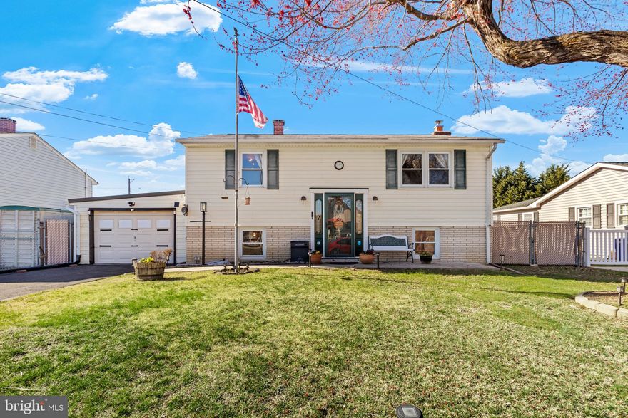 Welcome to 357 Miles Road in the water privileged community of Middleborough. Located at the end of a cul-de-sac, you will experience the peaceful enjoyment of your home with water views from your front porch and from your bedroom window. Once you step inside, you will realize that this is not your typical split foyer home. The main level of this smart home features a huge family room with a pellet stove. At the back of the family room, you will find a cozy nook tucked away from the main part of the room. This space makes a great office, but could also be used as a play area, crafting room, gaming corner, or whatever suits your needs. Sliding glass doors lead from the family room to the serene screened porch where you can enjoy quiet evenings or entertain your friends and family. Just off of the family room, you will find the kitchen, dining room, and full bath.  The kitchen contains the main display for the Smart Home system.  From here (and also from your phone and other devices), you can control the lights, thermostat, ceiling fans, tv's, garage doors, security cameras, and more.  Your smart home not only adds convenience, but it also helps make your home more energy efficient.  Moving to the upper level, you will find four generously sized bedrooms. The two bedrooms in the front of the house have water views. The upper level full bath was renovated in 2024.  Through this bathroom, you will find an in-law suite that spans the length of the back of the house! There is a private entrance from the exterior directly into the in-law suite. The suite consists of two rooms: a large sitting room with sink and a separate bedroom. There is also access to the upper level bathroom. This flexible space could also be a great guest room, additional office space, play room, craft room, gaming room, or even a primary bedroom with an enormous walk-in closet! There are so many possibilities! This home contains both an attached and detached garage that can accommodate three vehicles. This is an incredible property that needs to be seen to be fully appreciated! Recent improvements include fresh paint throughout, new carpet throughout (there is hardwood flooring under the carpet on the upper level), new light fixtures throughout,  new central kitchen island, storage cabinet, and coffee section, upper level bathroom recently renovated, new garage doors, new decking on screened porch, installation of smart home components, and more! All of this and a fabulous location convenient to 695 and 95.  Norman Creek Marina is just a short walk from the house. In addition, there is no shortage of great restaurants within close proximity,  as well as any other amenities that you may want or need. Make an appointment today. You can be living the good life in your new home in time for summer!