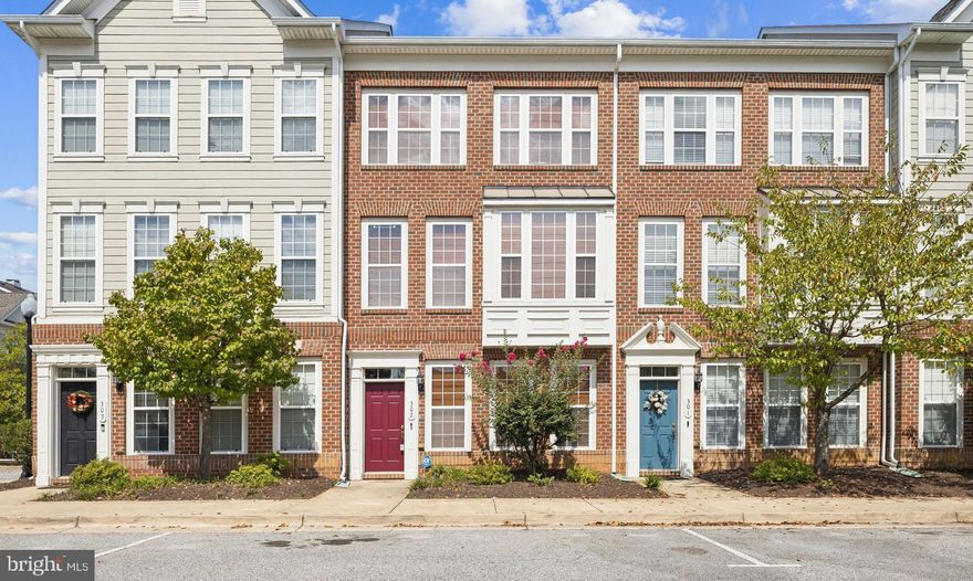 Spacious three level townhouse with a two car garage in the heart of La Plata. Just steps from shops, restaurants, parks, and community events, this home offers convenience and comfort in a private neighborhood with a pool and clubhouse. Inside you will find plenty of natural light throughout. The entry level includes a versatile den, full bath, and laundry area that can be used as a home office, guest space, or even a fourth bedroom. The main level features an open kitchen, dining, and living area with built in shelving, an electric fireplace, and balcony access. Upstairs the owner’s suite has a tray ceiling, oversized walk in closet, and private bath along with two additional bedrooms, another full bath, and a linen closet. Recent updates include a brand new HVAC system and water heater installed in June 2025. This home is clean, well kept, and move in ready for its next owner.