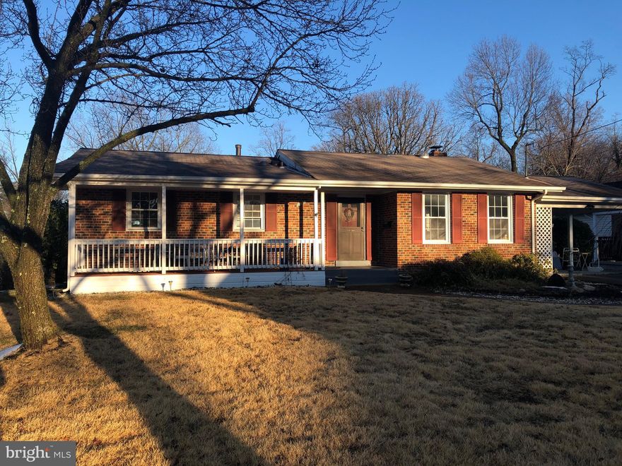 Classic Main-Level Living in close-in Springfield/Franconia!  3 Bedrooms & 2 Full Baths main level, One Bedroom & one Full Bath on the lower.  Huge half-acre lot with a Koi pond & stream toward the back.  Cross the picturesque bridge, and the rest of the lot backs to the local Community Pool!  Wide carport, Deck off Dining Room with stairs down to yard.   Fresh paint throughout, new carpet downstairs, hardwood floors up.  Wonderful light on both levels - more pics early next week.  Offers will be reviewed Monday evening.