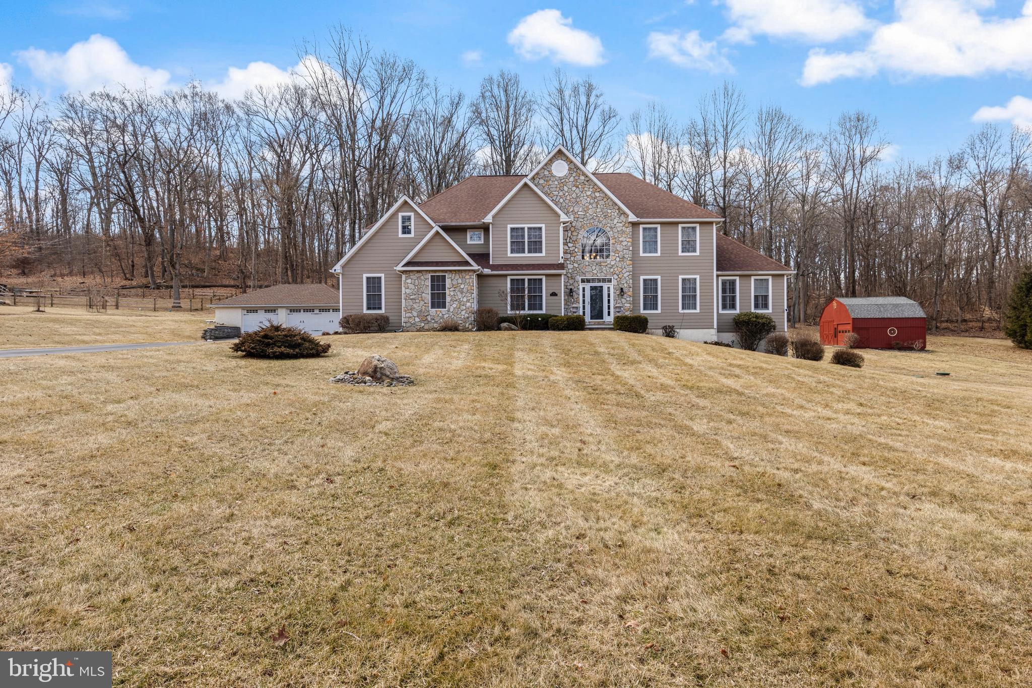 Stunning Updated Colonial Home in Thornbury Township
Nestled on a spacious 2-acre lot, this meticulously maintained colonial home offers the perfect blend of luxury and sustainability. Located in desirable Thornbury Township and within the award-winning West Chester School District, this home boasts over 4,000 square feet of living space with four bedrooms, three full baths, and two half baths and finished walk-out basement, providing ample space for comfort and style.
Key Features:
Gourmet Kitchen: Updated kitchen with top-of-the-line Wolf appliances for the culinary enthusiast. Energy-Efficient Living: Geothermal heating with electric heat pump backup. Solar power covers electric bills, heating, air conditioning and hot water. The home also features a whole house generator operated on propane when necessary. The current owner hasn’t received a PECO bill this year! Solar panels were updated in 2024 and are paid for, not leased. Sustainable Systems: Well and septic system ensure minimal utility costs, with the septic system tanks updated in 2024. Ample Parking & Storage: 3-car attached garage, 3-car detached garage, and an additional outbuilding "Barn" ideal for extra vehicles, lawn equipment, or a workshop. This home is perfect for the car collector or enthusiast. Finished Walkout Basement: Nearly 1,000 additional square feet of living space with a propane fireplace, half bath and ample storage space. Entertainment center and TV are included with the purchase. First-Floor Elegance: Grand two-story entrance with traditional colonial layout, family office to the left of foyer and formal living room to the right. The dining room adjoins the formal living room and a light filled sunroom adjacent to both living and dining room. The eat in kitchen with breakfast bar, connects to the expansive family room with vaulted ceilings and propane fireplace. There is access to the backyard and deck from the kitchen area that provide simple flow for make hosting BBQ's. Outdoor Entertaining: Trex deck overlooking a serene, tree-lined backyard perfect for relaxing or entertaining guests. Low Maintenance Exterior: Durable HardiePlank siding for years of low-maintenance living. Prime Location: Award-winning West Chester School District (Rustin HS, Stetson MS). Low Taxes: Enjoy the benefits of low taxes for a home of this size. Impeccably Maintained: This home has been lovingly maintained and well thought out with regard to systems, ensuring long-term reliability and peace of mind for the new owner.Why You’ll Love It. This home offers unparalleled luxury and sustainability, making it the ideal place for anyone looking to combine comfort with energy efficiency. With almost no utility bills and an abundance of space and amenities, this home is for the Buyer that can discern Cost Vs. Value.