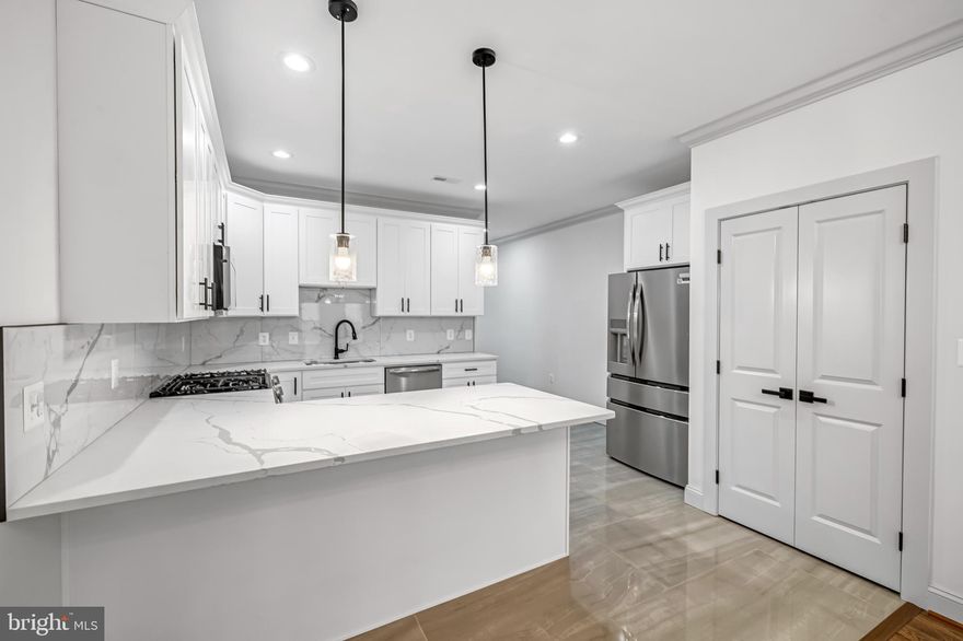 Income producing and living!

Welcome to the heart of Baltimore City living! This beautifully designed 6-bedroom, 4.5-bathroom home offers unmatched style, comfort, and convenience. Perfectly situated near major highways, commuting to Washington, D.C. or surrounding areas is a breeze. Just minutes from downtown Baltimore’s top hospitals, this home is also within walking distance to Camden Yards and M&T Bank Stadium—ideal for sports lovers who want to catch a game without the hassle of parking. Plus, enjoy the vibrant local culture with Hollins Market right around the corner.

Inside, you’ll be greeted by gleaming hardwood floors, detailed crown molding throughout, and a custom kitchen and bathrooms that blend elegance with modern functionality. The home features two master suites, giving you flexibility for multi-generational living or luxurious guest accommodations.

The fully finished accessible dwelling unit (ADU) in the basement is a true bonus—offering two bedrooms, one bathroom, and its own independent heating and cooling system. Whether you choose to use it as an income-producing rental or private guest space, the possibilities are endless.

With thoughtful upgrades and attention to detail at every turn, this home combines the best of city convenience and modern living in one incredible package.