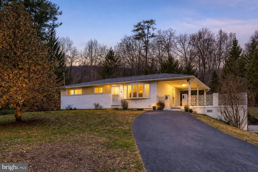 Picturesque Views of South Mountain in Dillsburg, PA, make this country ranch home a place to call home. This home has over 1,300 square feet of living space with 3 bedrooms, 1 bath and a kitchen with all the upgrades. If that's not enough then there is a oversized family room that you can sit and enjoy the wildlife from the comfort of your own lounge chair and enjoy a hot drink by the gas stove in those winter months. In the warmer weather entertaining becomes a joy with the large concrete patio/deck. 9.80 acres separately deeded and contiguous could also be purchased with this home site (PAYK2101846), all that is missing is you!