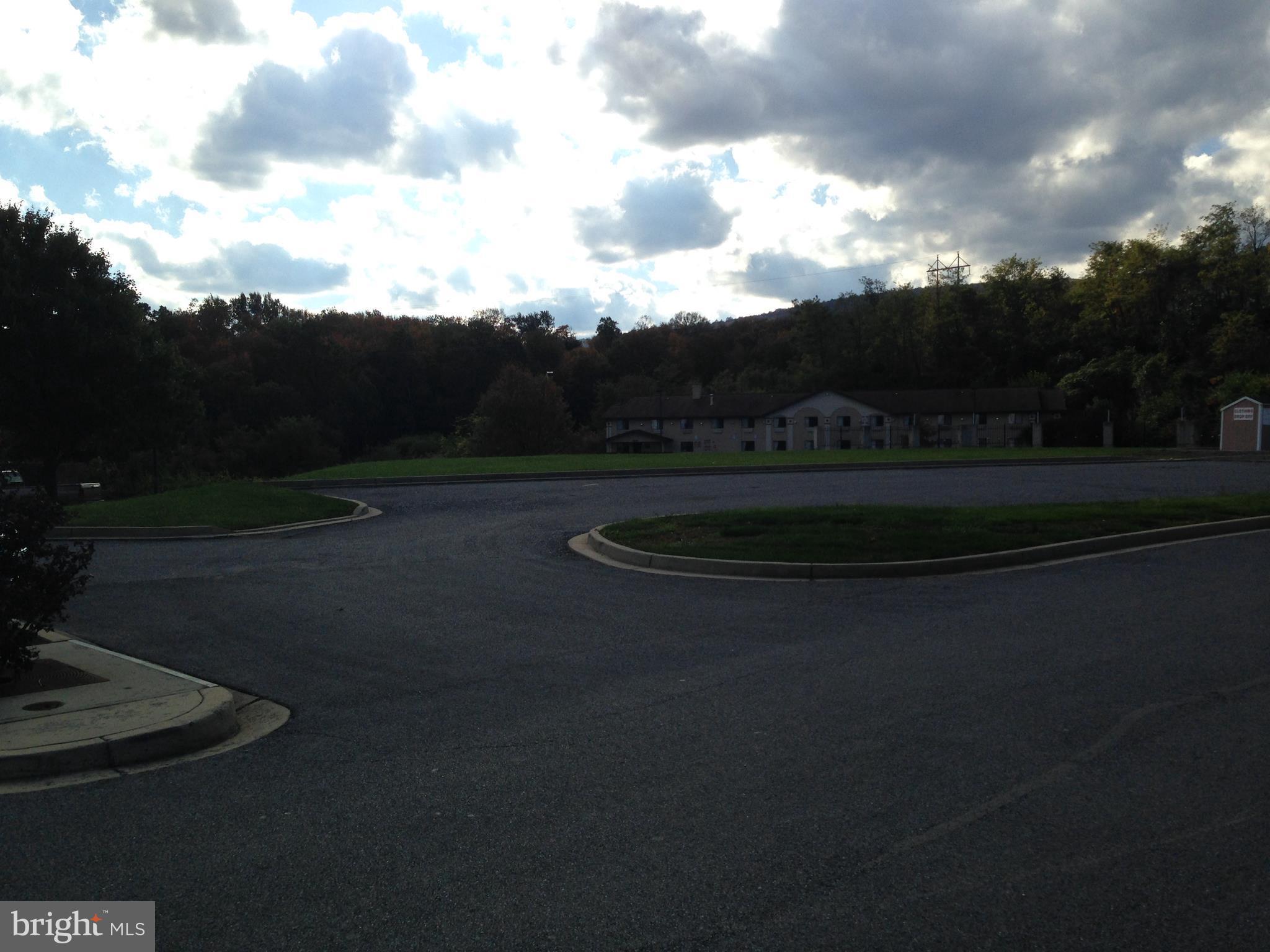 Land lease available at Orchard Village Shopping Center in Thurmont, MD. Site can house up to 6,000 SF building (to be built). Commercial use including Retail or Office. Great Location with a lot of exposure. Current Tenants at the Center include Food Lion, Dollar Tree, Wendy's, Rocky's Pizza, and others. Prospective Tenant to build their own building on the pad site. Price is negotiable.