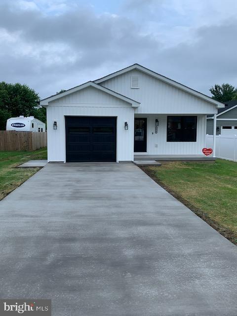New Construction in Strasburg! One level living at it's best!! Beautiful 1440 sq/ft Rancher with 3 beds & 2 full baths with attached 14x22 one car garage! One step from garage into house! With LEVEL concrete 2 car driveway and sidewalk! Tons of upgrades have been added to this home! The exterior features 5x15 concrete covered front porch with Ring camera & board batten! The lot is nice & level with a rear 8x10 concrete patio! The crawlspace has been professionally conditioned. The interior has full size Washer/ Dryer & Laundry tub with extra cabinets! The entire home flooring is LVP throughout for you pet lovers! The kitchen features GE Stainless appliances, Refrigerator w/water & Ice, Built-in Microwave, Dishwasher, Garbage Disposal, SS single bowl with pull faucet, Self cleaning Stove with all the bells and whistles, Granite counter tops, recessed & under cabinet lighting & a 6 foot Island w/power! Both bathrooms have Moen fixtures and Granite top vanities! The primary bath has a walk-in shower! The large living room has a raised ceiling with fan and recessed lighting! Also, all three bedrooms have ceiling fans. Multiple receptacles with manufacture USB ports! Fenced on two sides! Close to everything in town, shops, restaurants, doctors, town park and the Shenandoah river! Less than 5 minutes to I-81! One year builder warranty & NO HOA!! This one level home with easy access is a must see and won't last long!