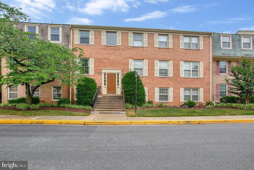 Location, Location, Location!! This two bedroom, one bath condo is close to everything.  UMD, NASA, 495, 95, BW Parkway, Shopping & more! It has a balcony over looking the green area & is peaceful for your morning coffee or drinks in the evening.  Brick accent wall in dining room, kitchen has newer gas stove & refrigerator & shelving unit for storage.  Three ceiling fans, mirrored closet doors in bedrooms, linen closet, hall closet &  laundry facilities on lower level with key access.  Lots of natural light & spacious rooms.  Parking is street parking or lot across the parking, very convenient.  Condo fee covers the Utilities, water, electric & gas.  Curtains in Living room & Both Bedrooms DO NOT CONVEY.  (Extra paint has been left if needed for touch ups) Dish Washer is working but Sold As-IS.