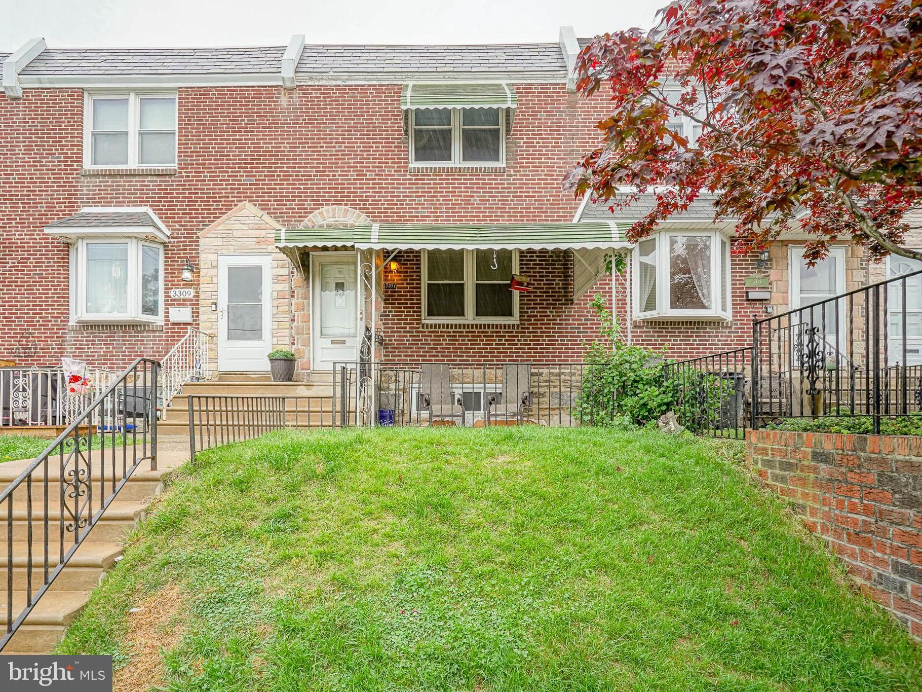 Welcome to this beautifully maintained row home located on a quiet block in desirable Mayfair. This home features 3 bedrooms and 1 full bath. Enter to find a spacious living room with newly installed laminate plank hardwood floors and fresh paint. Continue to find a formal dining room that leads to the kitchen that has been well-maintained with updated appliances and built in microwave. The upper-level hosts 3 bedrooms, all with ceiling fans and closet space, as well as the freshly update bathroom, shower/soaking tub combo, new vanity and toilet. The lower level is a partially finished basement with carpet, separate laundry room, storage area and providing convenient access to the garage and driveway. The rear of the property has a driveway that provides off-street parking.
