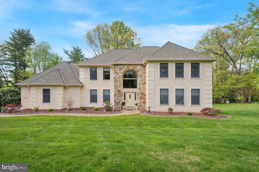 Welcome to 24 Dartmouth Lane located in the prestigious and highly desirable Merion Golf Manor neighborhood.  Situated down a long driveway, enjoy the private park like setting this property has to offer.  Enter into the center hall with double coat closets and powder room. The spacious living room with brazilian cherry flooring features pocket doors which open to the light filled family room with wood burning fireplace.  The gourmet eat in kitchen features a large corian island, double wall ovens, subzero refrigerator, built in cook-top, dishwasher, ample cabinetry and built-in desk space.  Conveniently located off the kitchen is the large dining room with decorative chair rail.  A mudroom featuring laundry, coat closet, pantry closet and back stairs, also provides access to the attached oversized three car garage with new epoxy flooring. The Kitchen provides access through a sliding glass door to the back deck (trex) with pergola, perfect for summer barbecues or sipping your morning coffee.   The second floor boasts a spacious primary suite with tray ceiling, sitting room, his and her closets, office nook and primary bathroom with double vanity, soaking tub and stall shower.  Four additional well sized bedrooms with great closet space, and two full hall bathrooms complete this level.  The fully finished lower level features a large recreation room with gas burning fireplace, potential sixth bedroom with full bathroom and plenty of storage.  The rear yard provides ample privacy and mature plantings.  Conveniently located close to shopping, transportation, renowned schools and easy access to all the Main Line has to offer!  This is truly a must see!