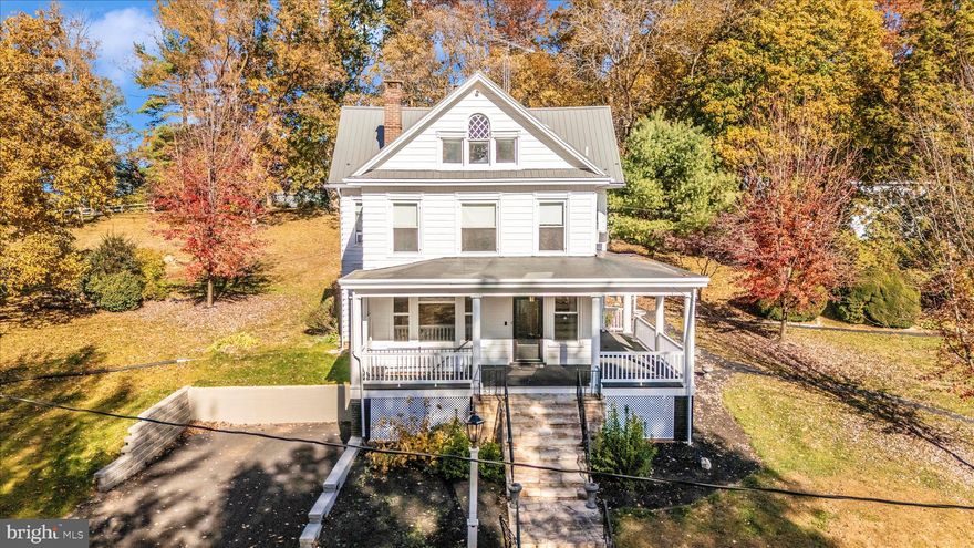 **Price Improvement** 
 
Welcome to 2027 Lincoln Way East, a charming victorian farmhouse dating back to 1903. This home is nestled on over 5 acres with 5 bedrooms and 4 bathrooms, featuring a main farmhouse, an apartment, barn, stable, and beautiful fenced in pastures. Horses allowed! This piece of history is extraordinary as the owners of this home owned and operated Sunnyside Antiques for over 50 years. Driving up the gorgeous tree lined driveway accompanied with stone piers you’ll  see the victorian main house that features 3 bedrooms and 2 full bathrooms and a stunning fireplace that goes the whole way to the basement. Luxury vinyl plank flooring has been updated throughout, newer windows and a large wrap around porch to enjoy the mountain views! The apartment in located in the back of the second and third floor featuring 2 bedrooms and 2 bathrooms with 2 doors separating the apartment from the main house. The barn has been home to Sunnyside Antiques for over 50 years with original features and comes equipped with propane wall units and central air as well as  recent updated siding and a new roof! Bring your livestock! The shed and stables provide ample space for all your needs! This one is truly a unique find; beaming with history and beauty! Don’t miss it!