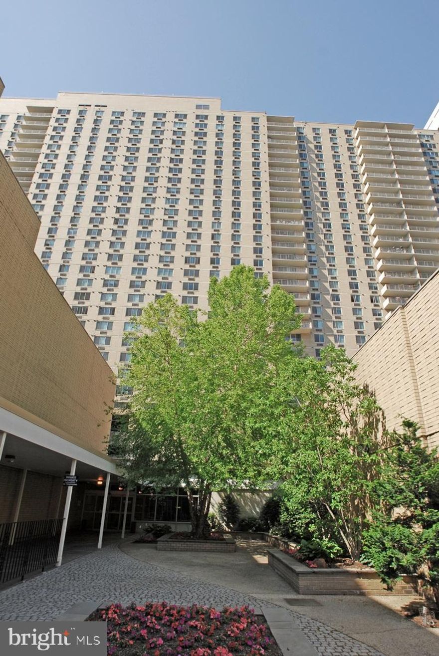 Don't miss this 2 bedroom, 2 bathroom, corner unit with a fantastic balcony at the sought after William Penn House.  Located in desirable Rittenhouse Square, this Northeast facing, 1,176 sq ft unit is ready for you to make it your open.  The spacious living and dining area offer beautiful city views through the wall of sliders that lead to the private balcony.  The galley kitchen offers lots of storage and laundry.  Primary bedroom suite with ample closet space and full ensuite bathroom with large walk-in shower.  Second bathroom and full hall bathroom complete this unit.  This building features 24-hour Security and Doorman, On-Site Management and Maintenance, Rooftop Pool with amazing views of the city. On premise VALET Parking available for 100 per month for one car. THE MONTHLY FEE INCLUDES ALMOST EVERYTHING: All Utilities including electric, heat, air conditioning, water & basic cable, All Real Estate Taxes & Maintenance Package. This unit has an abundance of closet space, newer windows in unit! This spectacular building has NEVER HAD AN ASSESSMENT! Nominal real estate transfer tax & no title insurance required. Experience the ability to walk out your door to first class, 4-star restaurants, fabulous shopping & all the conveniences of this sought-after neighborhood. Walk score is a 98! One time admin fee paid at closing.