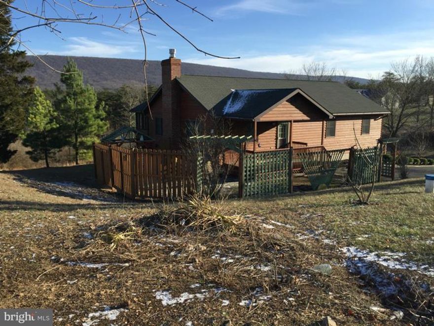 Great location with mountain views on 3.2 acs,Cedar 3BD 2BA home on full basement with garage and workshop,large deck,screened porch, paved driveway and above ground pool.Home features cherry wood floors and beautiful kit. cabinetry. Comes with home warranty, Selling bonus, buyer closing assistance with reasonable offer and $300.00 towards pool startup. Fresh landscaping and newly sealed driveway.