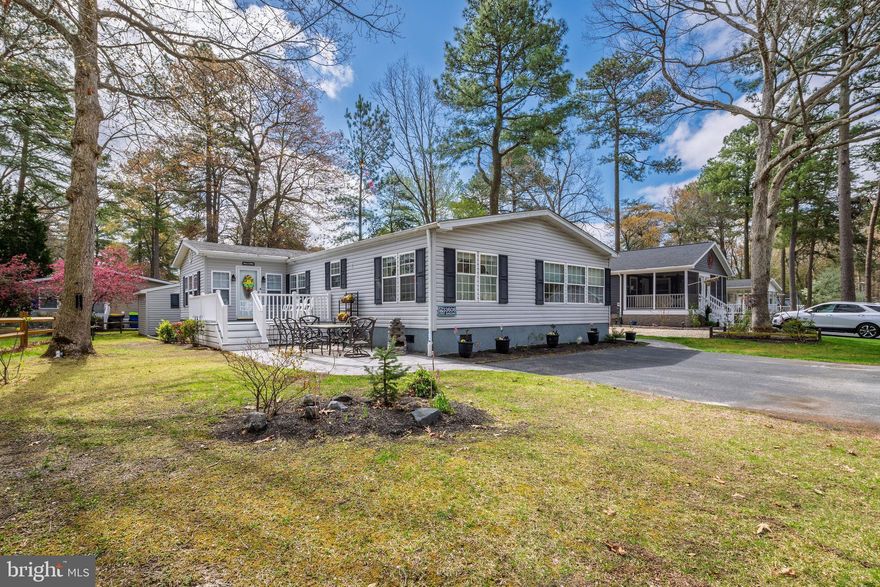 Seller MOTIVATED........will consider ALL OFFERS!!!!   SUMMER is Coming!!!!!!!!   Welcome to Your Dream Home in Pot-Nets Lakeside!

Step inside this beautifully upgraded 3-bed, 2-bath Doublewide home nestled in the amenity-rich Pot-Nets Lakeside community — one of the most sought-after lifestyle neighborhoods in southern Delaware. Surrounded by lush landscaping and just steps from the community’s six-acre lake, this home invites you to enjoy serene park-like views and an enviable coastal lifestyle.

Inside, the open-concept living space boasts bright, modern finishes and thoughtful upgrades throughout. The heart of the home features a spacious kitchen with updated cabinetry, premium countertops, and room for casual dining, perfect for everyday living and entertaining alike. The adjoining living and dining areas flow seamlessly, creating a warm and welcoming atmosphere.

Retreat to the primary suite with its own private bathroom, while two additional comfortable bedrooms offer flexible space for guests, a home office, or hobby room. A second full bathroom showcases quality fixtures and contemporary design.

Enjoy peaceful mornings and warm Summer Evenings on the Gorgeous, Brand New March 2026, Private Outdoor Trek Deck, ideal for Grilling, Gardening, or simply Enjoying the fresh Delaware air. A lovely spot to entertain, have Happy Hour, Enjoy Crab Picking or a Nice Evening Dinner!!!

With nearby walking paths, gazebo areas, neighborhood pool access, and a short golf-cart ride to private beaches, Pot-Nets Lakeside is truly a place to live your best life.

Whether you’re looking for a year-round residence, a coastal vacation retreat, or an investment property, this upgraded home offers comfort, style, and the lifestyle you’ve been seeking in one of the area’s most charming communities.

Many Upgrades, Fresh Landscaping and NEW DECK BEING BUILT!!!! SOLD Partially Furnished.