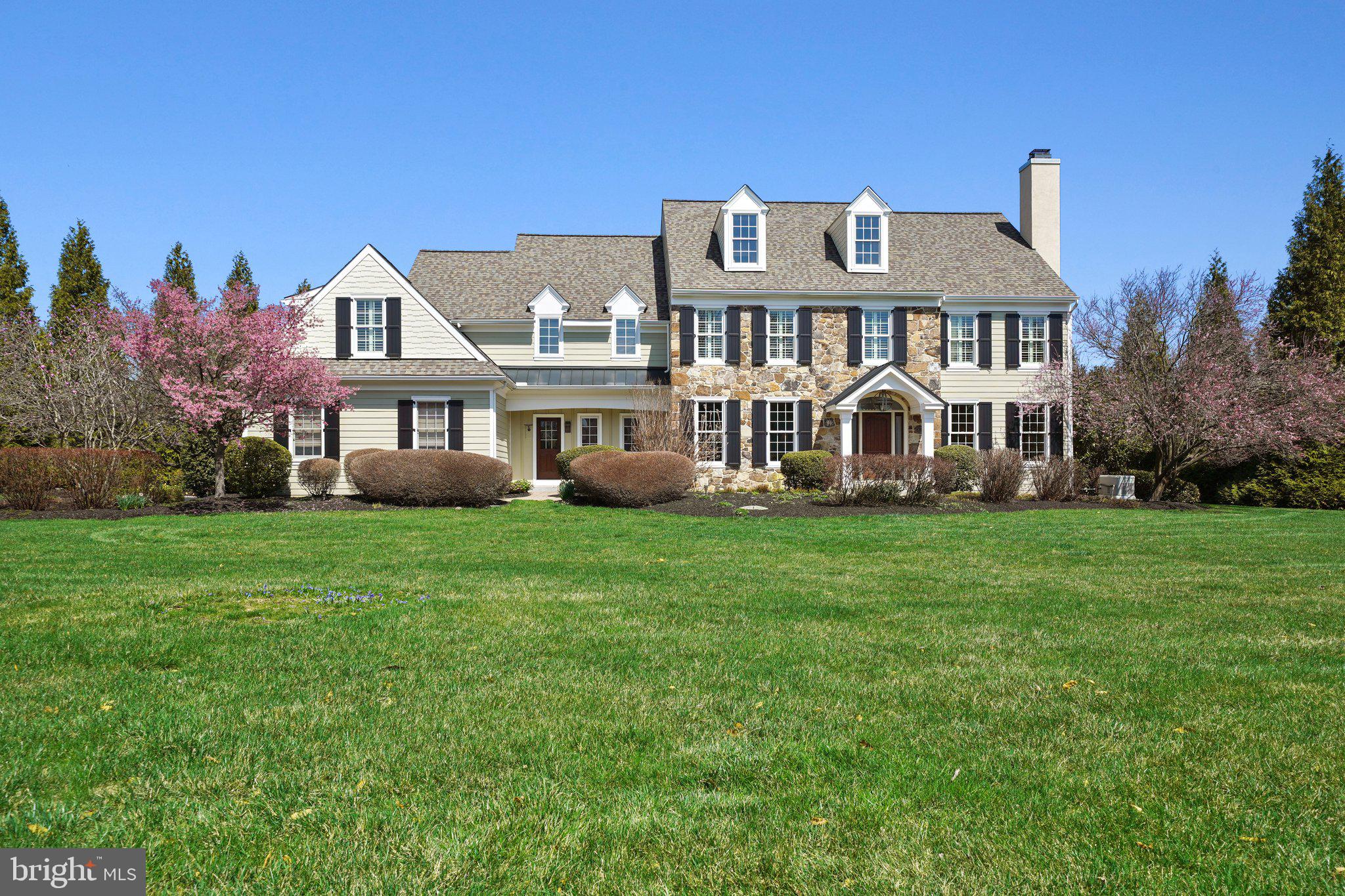 Stunning Estate Home in the Unionville-Chadds Ford School District. Nestled on a beautifully landscaped 1.40-acre lot with public water and sewer, this exceptional 5-bedroom, 5.1-bath home offers the perfect blend of luxury and convenience in a highly sought-after location. The striking Hardie-Plank and stone exterior is enhanced by extensive hardscaping, while the heated saltwater pool with spa creates an ideal setting for entertaining and relaxation. A grand two-story foyer welcomes you with rich wainscoting panels, gleaming hardwood floors set a refined and inviting interior. The large gourmet kitchen is truly the heart of the home, it boasts 42-inch white cabinetry, granite countertops, double ovens, induction cooking, a large center island with table seating, and a bar with wine cooler and sink. The expanded breakfast area provides seamless access to the Trex deck, which leads to a fieldstone patio featuring an outdoor built-in grill and gas fire pit with a pergola. Custom stone steps descend to the stunning built-in 20x40 heated saltwater swimming pool with spa, while the beautifully landscaped backyard creates the perfect setting for hosting gatherings or simply relaxing in a resort-like atmosphere. The expansive family room features a custom stone fireplace with large windows with views of the pool. A private study with built-ins and formal living and dining rooms further enhance the home's timeless elegance. A rear staircase offers convenient access to the second floor, seamlessly connecting the kitchen and family room.
Upstairs, the Owner’s Suite serves as a private retreat, featuring a separate office/sitting room with a breakfast/coffee bar & beverage cooler. The suite also boasts a tray ceiling, two walk-in closets with custom built-ins, and a spa-like en-suite featuring a soaking tub and walk-in shower. Down the hall are 4 more bedrooms all with expanded closet space. A Princess Suite includes its own full bath, while two additional bedrooms share a Jack-and-Jill bath. An Au Pair or In-Law Suite, located above the three-car garage, offers a private space with two rooms and a full bath.
The large finished lower level is designed for entertaining, featuring a cozy fireplace, exercise area and plenty of space for billiards. This level also includes a full bathroom, a large custom closet with built-ins, and pre-plumbing for a future kitchen. The walk-out design provides direct access to the lush backyard and pool, which backs to HOA open space, creating a peaceful and private setting.
Meticulously maintained, this home boasts numerous recent upgrades, including a whole-house generator, a new HVAC system, a new roof, and a complete pool renovation with a new heater. Ideally located just minutes from Longwood Gardens, residents can enjoy fireworks displays right from the front yard. This home is also within walking distance to Unionville Schools, close to the vibrant town of Kennett Square, minutes to the 202 Rt 1 shopping corridor and just 25 minutes to the Wilmington Train Station, offering easy access to Philly, New York City and Washington, D.C.
Homes rarely come available in Rockford Crossing. Don’t miss the opportunity to own this extraordinary home!