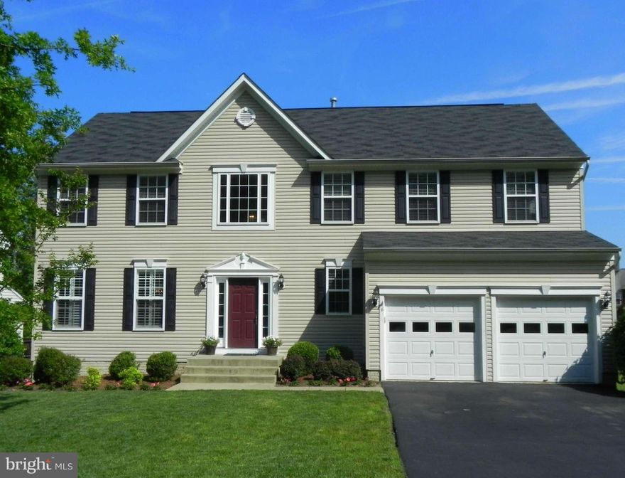 Beautiful Colonial featuring 5 Bedrooms, 3.5 Baths, Finished Walk out Basement with Huge Rec Room!  Dramatic 2 story Foyer, Formal Living Rm & Dining Room, Gourmet Kitchen w/42" Cabinetry, Granite, S/S Appliances, Tile Floor. Fam Rm w/Gas FP and custom Plantation Shutters. Grand Master Suite with Luxury Bath. Close to Walking/Jog Paths, Recreation/Tennis Courts yet tucked away on quiet street!