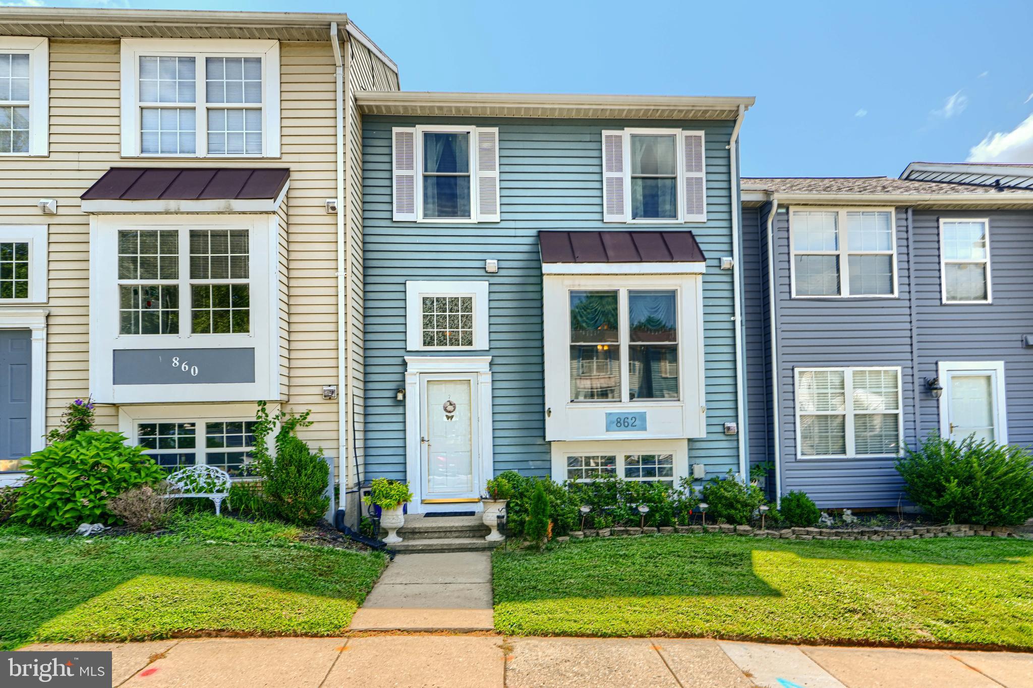 Welcome to this charming home in a quiet townhome community. This split-level offers the amenities and convenience of Hampstead. Three bedrooms and 1.5 baths with a newer washer and dryer set. The kitchen overlooks the dining area and has extra storage, including an island making meal prep convenient. The living room area is flanked by the outdoor deck -- perfect for another seating area and grilling. The walk out basement leads to a lovely landscaped rear yard with more shed storage.