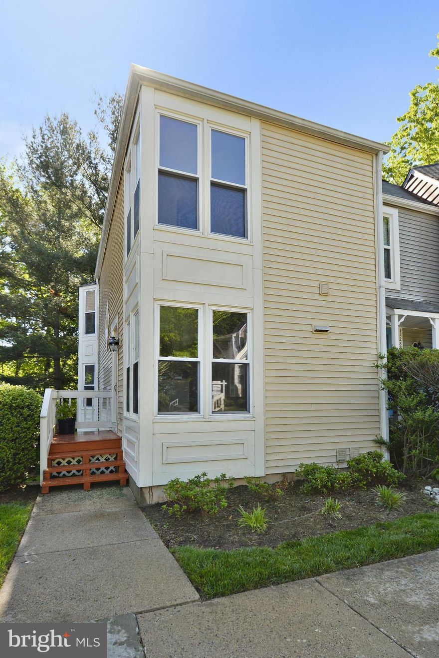 Too late - contract End Unit with loads of windows and nice Open Floor plan with a Fireplace in the Living Room!  Hardwood floors accentuate the main and upper levels, and fresh paint throughout makes it ready to move in to!  Lovely Deck off the main level is over a patio that's off the full Walkout basment. These units don't last long on the market, so better hurry!  Close to Metro, Shops, Rest.!