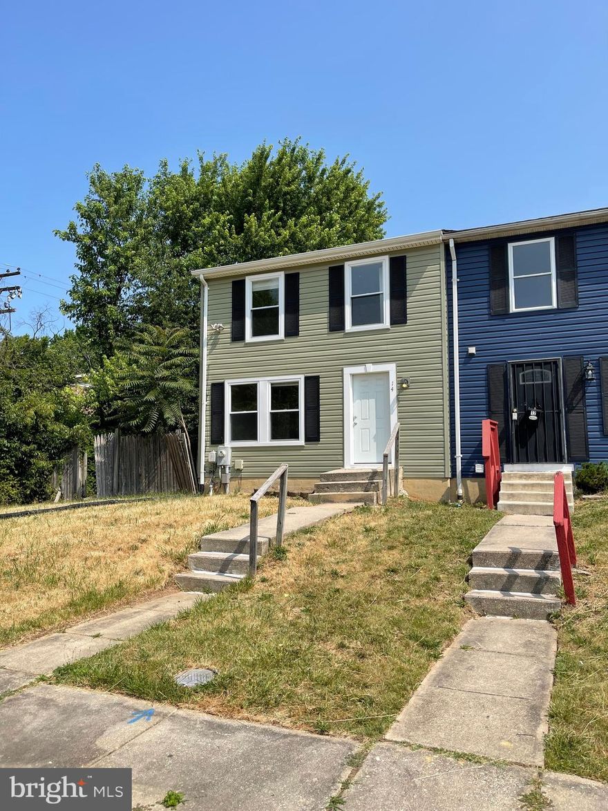 Spectacular end of row townhome. New roof with 30 year shingle, new carpet, freshly painted, new siding and trim on exterior, brand new kitchen cabinets, appliances and granite counter tops with newly tiled bathroom and fixtures. Newer windows. Quiet street. Dont miss this amazing home in a prime location.