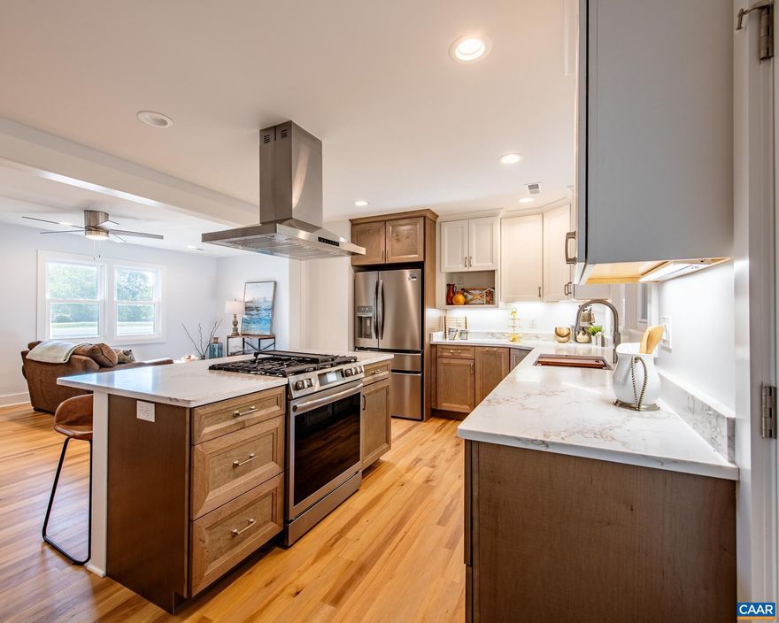 No Hassel Home Ownership! Don't Get Snowed In! LOCATION IS KEY!! Custom built & Newly Designed One Level Home close to everywhere you want to be! Featuring 3 Bedrooms & 3 Full Bathrooms, Open Kitchen full of windows, Private Laundry Room entry from carport. Separate Dining Room with HUGE Deck leading to Large level yard. Literally Rebuilt in it's entirety from floor to ceiling & everything in between! Plumbing, Electrical, Insulation, Sheetrock, Flooring, Trim & Hardware, Appliances, Roof, HVAC, Windows, Doors, Water Heater, Gas Line, Well & Septic...Deck, Carport, Porch, Driveway, Walkway & even the Yard have been Redone!!  You Name IT & it's been upgraded! Specifications Sheet attached. Truly a Must see!,Maple Cabinets,Soapstone Counter