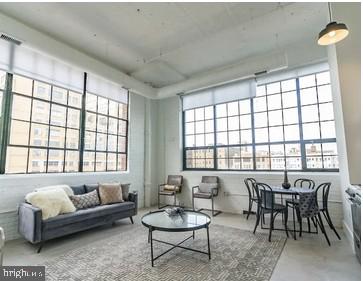 Wolf Building
Loft District
Complement your interests and personality by choosing this trendy Philadelphia neighborhood.
No matter what your specific style might be, a modern apartment in Philadelphia's Lofts district is your ticket to city-living satisfaction. With a variety of unit layout options, you are sure to find an ideal apartment that fits your preferences. The Regis Group has expanded this building with new amenities and on-site parking to continue to provide the best experience to residents.
The Wolf Building is only a 10-minute walk to Center City. This neighborhood is constantly growing with improvements such as the new rail park located just across the street. Blocks away from shopping on Spring Garden Avenue along with close public transportation. Whatever your needs might be, our team at The Regis Group makes it a priority to accommodate them.