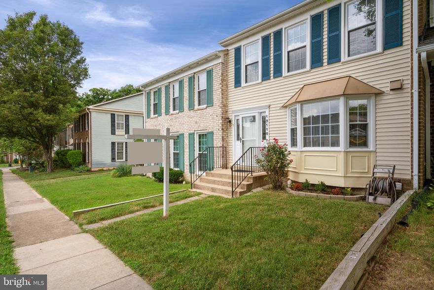 Attractive townhome with generous room sizes.  Freshly painted and newly installed carpet with updated appliances. The eat in kitchen has a bay window for viewing  this beautiful community. Basement is ready to finish with a wood burning fireplace. Family room leads to a private decked yard, fenced, with gate leading to common area.