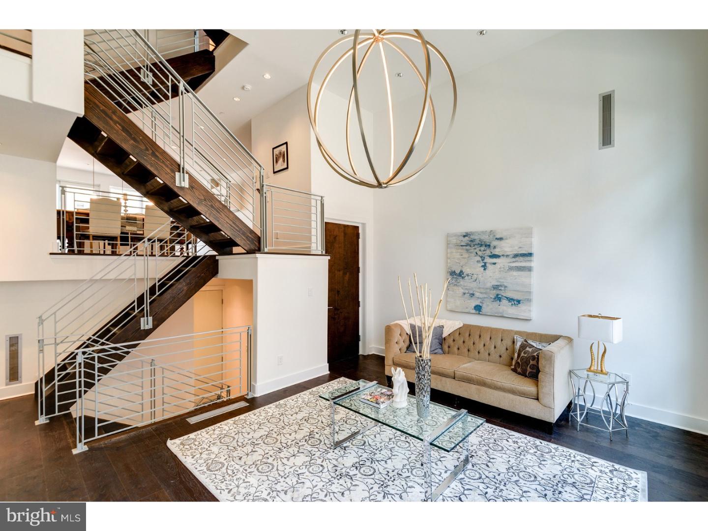 Welcome to Phase 2 of Kater Court, a gated townhome community in the Bella Vista section of Center City with 21 homes. This stunning home exudes luxury and is a perfect match for the discerning owner who is looking for a home that provides the ultimate in city life as well as a 10 year tax abatement. At 4,200 sqft, you'll find designer and custom finishes on every level and in every room. Pull into your 2-car garage or step in through the front door and you are immediately greeted by the expansive floor plan adorned by a beautiful open staircase. Head into the kitchen that will feature rare imported countertops, Wolf cooktop, built-in oven, Sub-Zero fridge, and imported tile backsplashes. Take the stairs or elevator to your guest level that features two guest bedrooms with one full bath and spacious closets. The Owner's suite level will feature a beautiful light-filled bedroom, incredible walk-in closets with custom shelving and a sanctuary-like bath. You'll never want to leave this space, but when you do, you have even more areas to enjoy on the roof deck level that has dual decks, powder room and wet bar. The entertaining doesn't stop there though, this home also has a lower level living room and media room which can be turned into a cozy home theater. With a smart home system that will allow you to control lights, temperature, blinds and media, these homes have everything you need and want and will redefine luxury living in the city. With new floor plans to maximize convenience and inclusive entertaining, this home is a must for any city dweller. Located right next to the Avenue of the Arts, Kater Court puts the city at your fingertips with endless dining, shopping and entertainment options. Live at 1329 Bainbridge and start enjoying everything this amazing home and city has to offer.