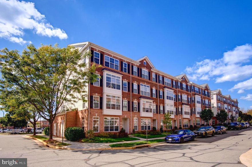 Welcome to this gorgeous end-unit condo just around the corner from Lansdowne Town Center. This desirable home offers both convenient street access and private entry from your one-car garage, with additional parking available nearby. As an end unit, it enjoys abundant natural light from multiple exposures, creating an open and inviting atmosphere throughout.
The main level features beautiful hardwood floors that flow seamlessly through the living room, dining area, and kitchen. The spacious living room showcases elegant crown molding and a cozy den alcove—perfect for a reading nook or home office. The dining room is highlighted by a brushed nickel chandelier and crown molding, offering a smooth transition into the open-concept kitchen and family room.
The kitchen is beautifully appointed with smooth granite countertops, raised-panel cherry cabinetry with a thoughtful mix of drawers and cupboards—including a pantry—plus a stylish mosaic tile backsplash and gas cooking. A large island with pendant lighting provides extra seating and workspace. The family room, open to the kitchen, features a charming corner electric fireplace, creating a warm and inviting gathering space. A conveniently located half bath is tucked away on this main level for guests. From the family room, step onto your private balcony and enjoy the twinkling lights of neighboring homes and businesses in the distance at night.
Upstairs, the wood staircase with a carpet runner leads to three spacious bedrooms. All new carpet and paint! The two secondary bedrooms are generously sized, offering deep closets, ceiling fans, and plenty of natural light. The secondary bathroom features classic tile flooring for style and durability. The luxurious primary suite serves as a private retreat, with a large walk-in closet and a deluxe bath showcasing a corner soaking tub accented by a mosaic tile design, raised dual vanities, and a separate shower. Plush, ultra-soft carpeting throughout the upper level adds warmth and comfort, while the laundry room with built-in cabinetry enhances everyday convenience.
This condo’s location is exceptional. Enjoy an easy stroll to Lansdowne Town Center, where you’ll find Harris Teeter, Starbucks, boutique shopping, a day spa, veterinary offices, and multiple dining options in a vibrant, walkable setting. The home is just minutes from historic downtown Leesburg and a short 10-minute drive to the Ashburn Metro Station. For commuters, the Dulles Greenway and MARC Train offer additional convenient routes to Washington, D.C., and Dulles International Airport is just 25 minutes away.
Loudoun County offers residents an incredible lifestyle with endless opportunities for recreation, dining, and entertainment. From golf courses and antique shops to acclaimed local wineries and breweries, there’s always something to enjoy. Nearby parks and trails provide access to the scenic Potomac River and outdoor adventures, while Skyline Drive and historic Harpers Ferry are just a short drive away.
This stunning end-unit condo perfectly combines low-maintenance, cosmopolitan living with proximity to Virginia’s scenic horse and wine country. Offering the ideal blend of comfort, style, and convenience, this home delivers the very best of both worlds.