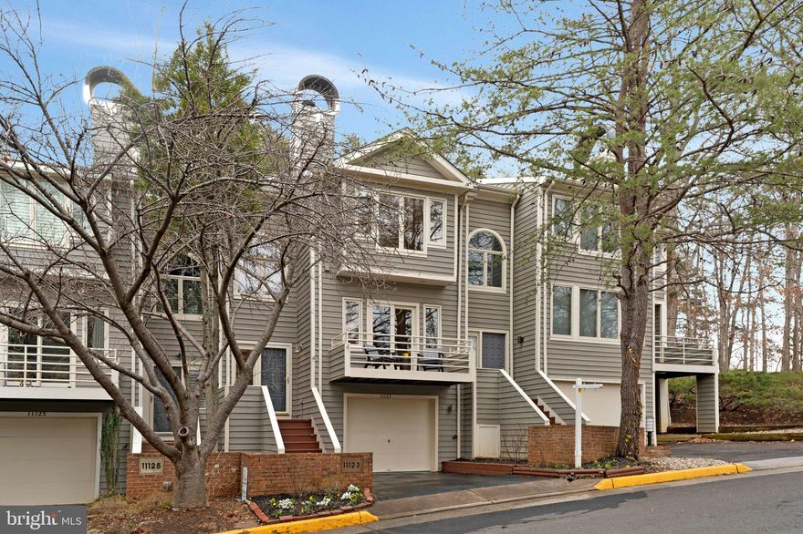 The perfect blend of modern luxury, technology, and lakefront lifestyle. Experience elevated living on Lake Thoreau in this stunning, updated modern townhome in Reston’s coveted Lakeport Cluster. Capturing the essence of Reston’s signature modern architecture, the home is filled with natural light, expansive windows, and a sophisticated open-concept layout ideal for both refined entertaining and comfortable everyday living.       

The updated kitchen offers abundant cabinetry, plenty of storage for all your kitchen tools and gadgets. Generous counter space, and a seamless flow into the main living and dining areas, as well as the outdoor space. Perfect for gourmet creations, hosting elegant gatherings, or enjoying quiet evenings at home.        

Upstairs, the spacious primary suite provides a private retreat with a spectacular spa-inspired en-suite bath featuring a double vanity, soaking tub, and walk-in closet. Two additional bedrooms are complemented by a dedicated home office, updated full bath, and convenient bedroom-level laundry.       

The finished lower level transforms into an exceptional entertainment space with a large built-in home theater screen, and a wet bar. Flexible for guest suite, office, or fitness area.        

Designed with the modern buyer in mind, the home is future-ready with hardwired high-speed internet across all three levels and an integrated smart-home assistant system. Steps to multiple visitor parking spaces for your guests' convenience.        

Garage features an EV charger, epoxy flooring, and generous storage for all your outdoor gear, keeping your kayaks and paddleboards ready to launch from the community dock.       

Perfectly positioned steps from Lake Thoreau, residents enjoy direct access to kayaking, fishing, and scenic lakeside trails, along with Reston’s renowned amenities including pools, tennis courts, and recreation centers.        

Walk (or paddle!) to shopping, waterfront dining, coffee shops, and everyday conveniences, minutes to the Silver Line Metro, Dulles International Airport, Toll Road, Parkway and highly-rated schools.       
Recent upgrades include a new roof (2026), water heater (2026), updated lighting, and flooring, making this home the perfect blend of modern luxury, technology, and lakefront lifestyle.