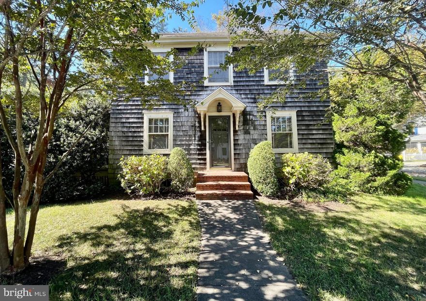 NEW PRICE, a one-of-a-kind charming Classic Rehoboth Beach Home. The main house has 4 bedrooms, and 2 bathrooms that features a first-floor bedroom, hardwood floors, living room-dining room combination with a stone wood burning fireplace, 3-bedrooms upstairs with the second bath needing fixtures, and another room that was in the process of being converted to a small kitchen that easily could  be used as another bedroom that has a screened porch. There is also a 1-car garage with 2 apartments. One with 2 bedrooms and 1 bath, and the other a studio apartment  with 1 bath. Other features include a full basement with a walk out entry, a brick sidewalk, patio and driveway, and  a total of 3-screened porches, 2-on the house, and 1 on the upstairs garage apartment, both with  active rental licenses. All of this is located 2 blocks to the beach on the corner of Bayard and Laurel Streets on an oversize 57 X 100 lot. The home is being sold AS-IS but ready for your special touches and renovations. It has great rental potential with  a possibility of  3 rental units and is an excellent investment opportunity with the limited inventory that we are experiencing today. Call for an appointment today!