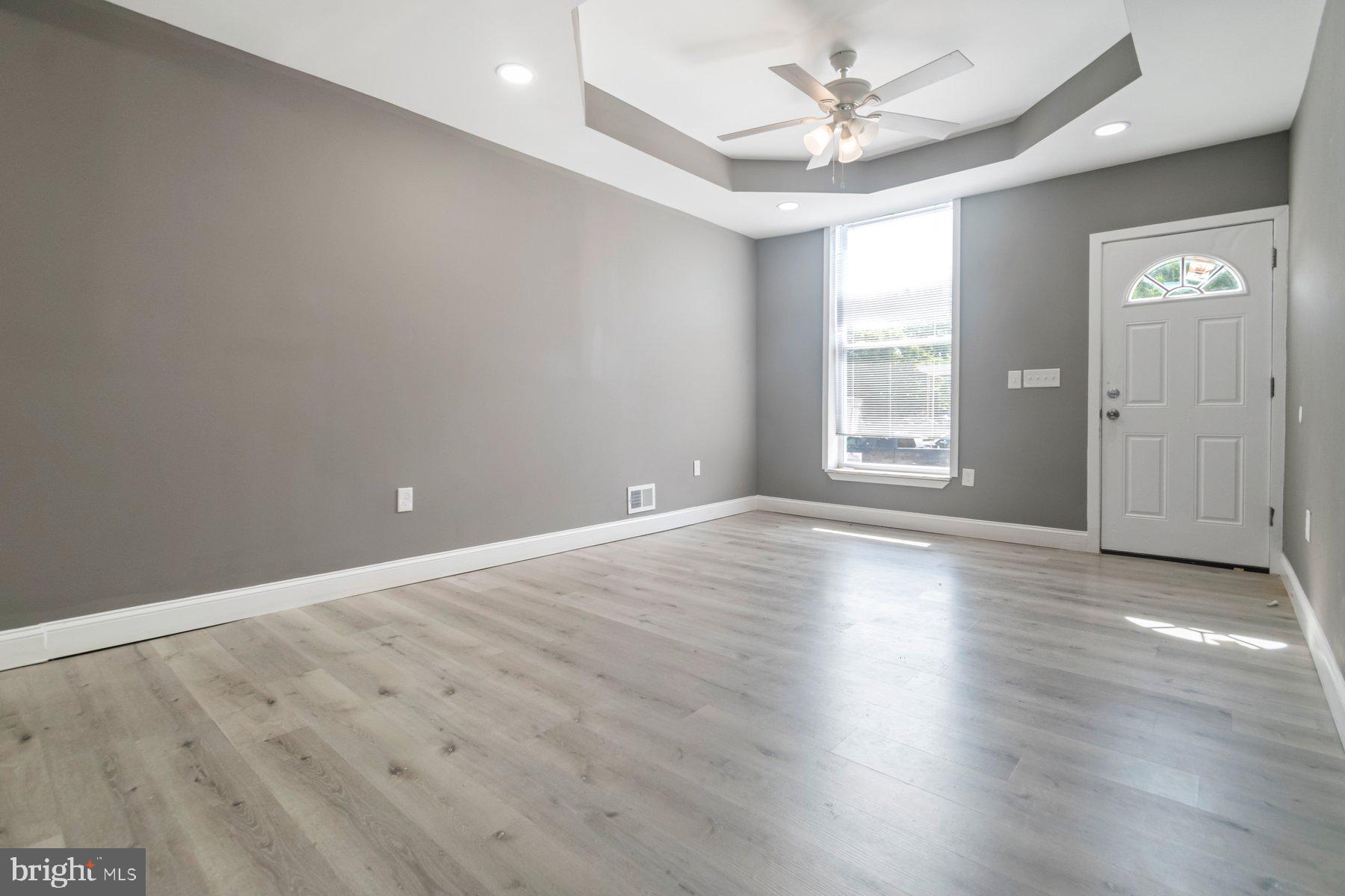 Beautifully remodeled 3BR/1.5BA Townhome located on a quiet street. Make your way to the front door of your new home and step inside to a home filled with tons of natural light, a newly painted interior, easy care and carpeted floors, and the open floor plan homeowners are seeking. The main floor boasts a large living room with a custom coffered ceiling, a spacious dining area, a half bath, and a brand new kitchen. The kitchen features plenty of cabinets, sleek quartz countertops with a beautifully tiled backsplash, and a deep stainless sink under a window. On the second floor are two sizable secondary bedrooms, a large primary bedroom, and a newly remodeled full bath. The lower level offers tons of opportunities for additional living space, laundry, storage, and a walk-out to the fenced yard. From the kitchen step outside to a yard filled with so many possibilities. This home is move-in ready with so much to offer new homeowners and is located in close proximity to shopping, restaurants, and commuter routes.