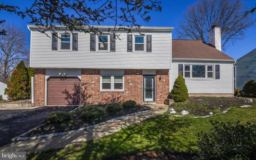 This beautiful home offers rare value and it is move-in-ready! It is the perfect opportunity for the meticulous buyer who is searching for a home with two complete living spaces at a very reasonable price point. Priced under $400,000 , you will not find anything like this on the market! The in-law suite is complete with a full updated kitchen with stainless steel appliances /dishwasher, a full bathroom, living room, office, one bedroom, separate laundry, and private entry access from the side.  The side entry offers a wheelchair-accessible ramp that leads you up to the patio with a retractable awning.  The bedroom offers airy vaulted ceilings and a skylight. This completely finished space is the perfect oasis for those relatives that mean the most to you. You can be sure that they will have all they need. Best of all, they will have you under the same roof. The main house offers a nice big eat-in kitchen that let's out to the large back deck with a built-in hot tub! The kitchen offers a ton of cabinet storage space, beautiful granite counter tops, a convenient breakfast island, stainless steel appliances, and really just a great place to host guests. Upstairs provides 3 generous sized bedrooms, an updated full-bathroom, laundry, and a finished bonus room that could be used for a home-office, a playroom, or even a 4th bedroom on this side of the home. This home has been very well-cared for and the pride of ownership is evident. If you think this could be the right home for you then do not delay. All offers will be presented to the seller this Monday 03/16/2020.