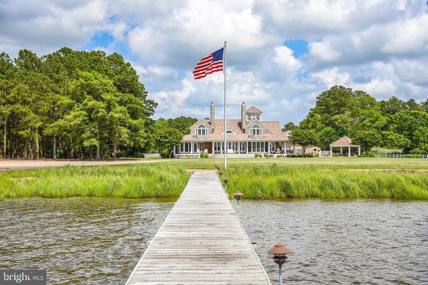 Exquisite Waterfront Estate!  If you are looking for a home that excels at every level, you have found it in this premier property. This 4,377 square foot home outshines others with its architectural elements and impressive attention to detail.  The estate is situated on the banks of the Wicomico River w/over 1500 ft of water frontage and is nestled on its own private 21 acre sanctuary which includes two ponds, barns, and experiences some of the best sunsets in Wicomico County.    The charming cedar shingled custom built home boasts water views from every room,  a grand entrance,  spacious foyer, impressive  living room with fireplace, large dining room with fireplace, gourmet kitchen, large family room with fireplace, screened porch, sunroom, and a 1st floor bedroom, with walk in closet and bath, second floor has an additional 3 bedrooms, two with balconies overlooking the Wicomico River & fireplaces, the other has views of the pastures and ponds, primary has a luxurious recently renovated bath complete with slipper tub, custom shower and large round window.  Exterior features include saltwater pool, gazebo, 4 car detached garage w/ heat and air and a private bath accessible from the pool.  Long lane to property is bordered by estate fencing and a quaint brick bridge separates the two large ponds, one with a fountain feature.   Two very large barns in the back of the property can house all the toys/equipment you would every want and one includes a golf simulator room.  Deep water dock with electric, water and boatlift,  yard/pasture irrigation, Solar field, 45KW Onan generator for whole house and so much more to mention, but space doesn’t allow.  It’s a rare opportunity to find a property like this that is a short distance to the Wicomico Yacht Club and only a 14 minute drive to the town of Salisbury and all its amenities.  Act quickly to request your private tour, as this is a rare opportunity.  A List of Furnishings and Mowing equipment included with full price contract available upon request.